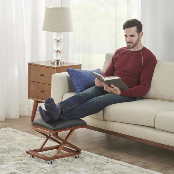Hammacher Schlemmer: The Adjustable Height Foldaway Ottoman