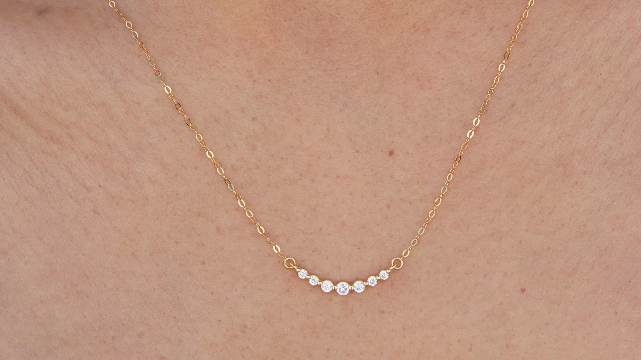 Savvy Cie Graduated CZ Curved Bar necklace
