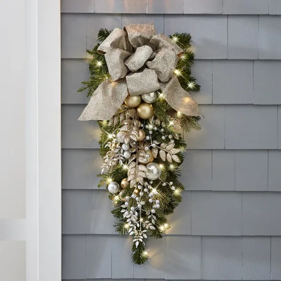 The Cordless Prelit Silver And Champagne Holiday Sconce