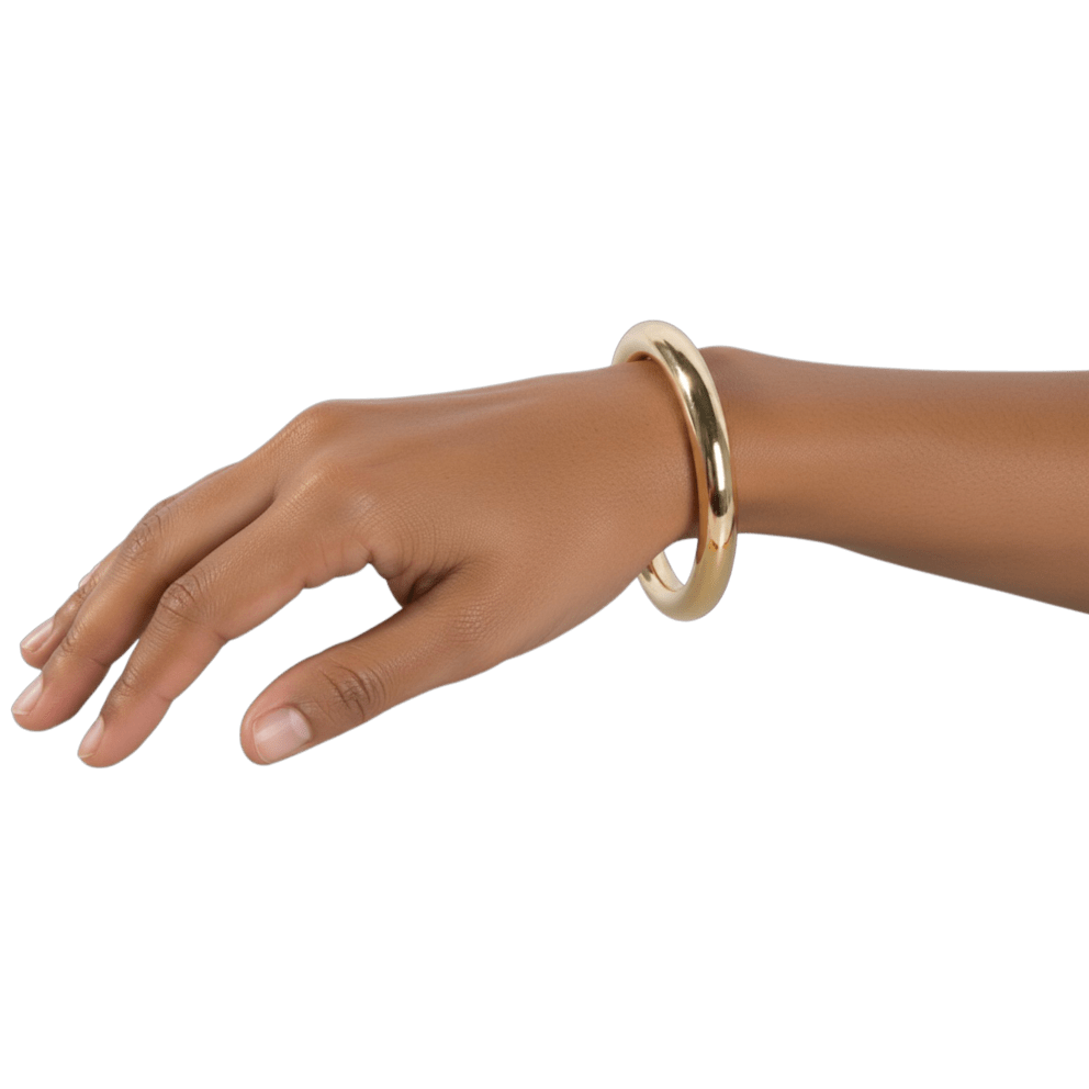 Minimal yet striking gold bangle with radiant shine.