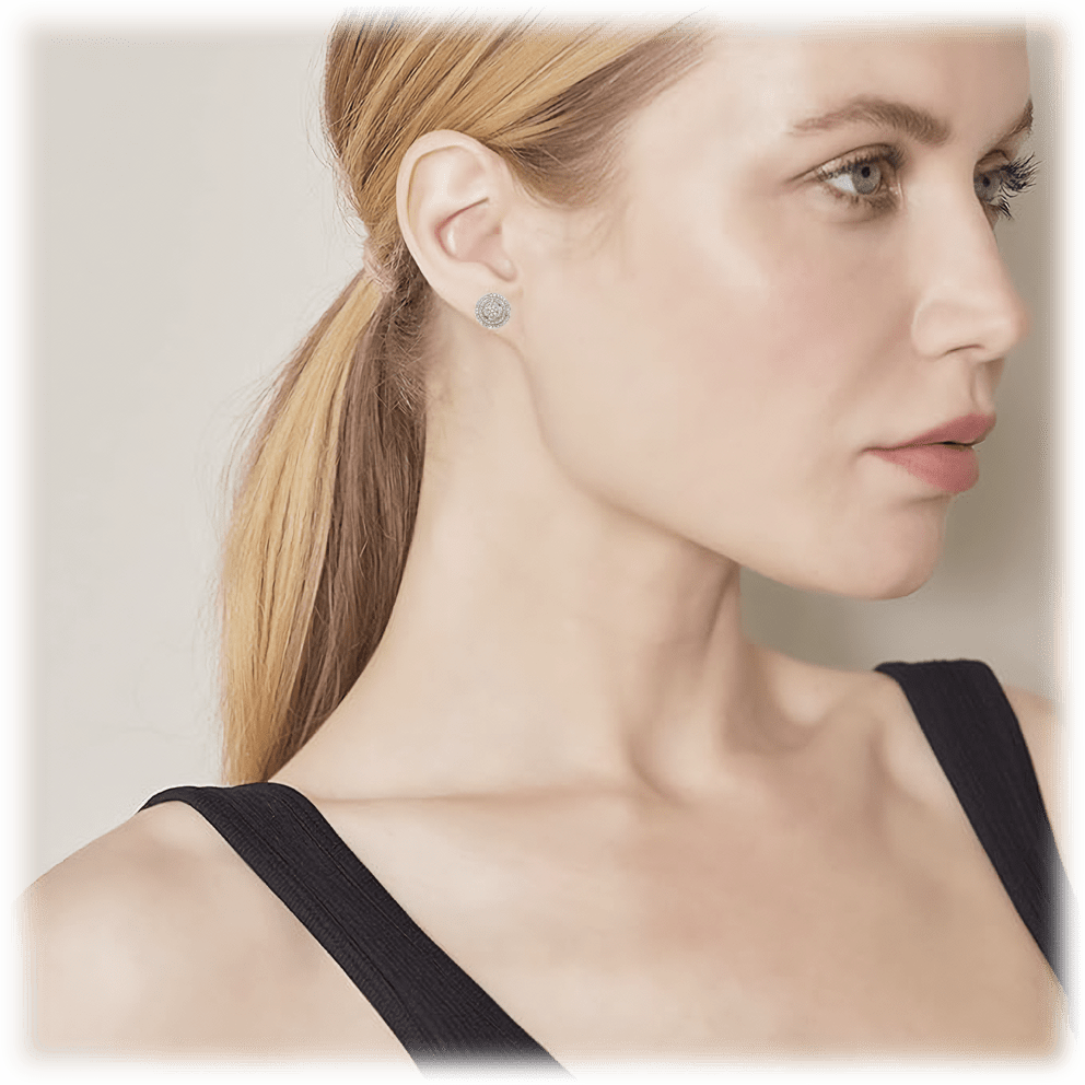 Set in sterling silver with a brilliant double halo