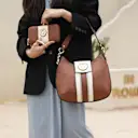 Torri offers a refined handbag set with luxe details and everyday function