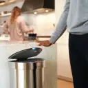 Sensors automatically open the lid with a wave of the hand