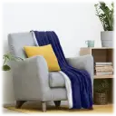 Reversible throw features micro-fleece fabric on one side & cozy sherpa on the other