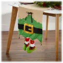 Features a green tunic with bells and a gold glitter belt buckle on a brown background
