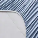 Snug Grip elasticized corners hold the sheet in place on your mattress