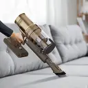 Versatile cordless design with 2 attachments to remove dust and pet hair from furniture, curtains, and more