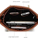 Features a wall zip pocket, two slip pockets