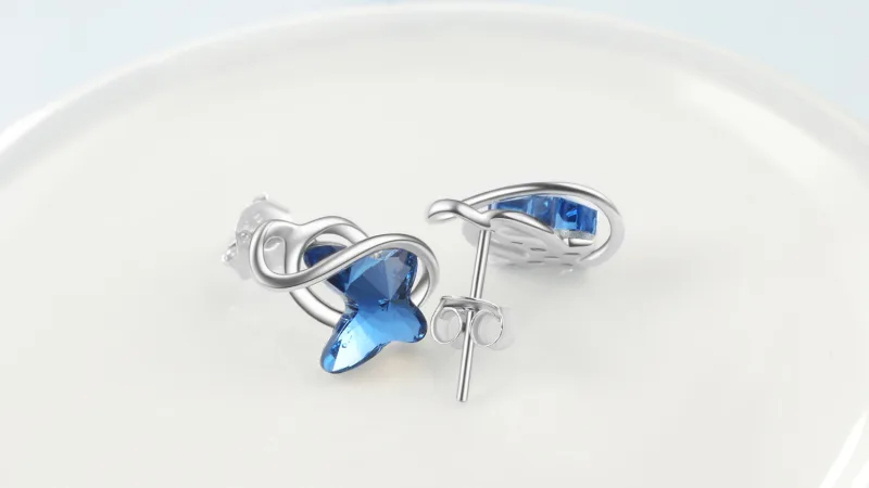 Rose And Lilly Pendientes de Mariposa de Cristal Azul en Plata Esterlina