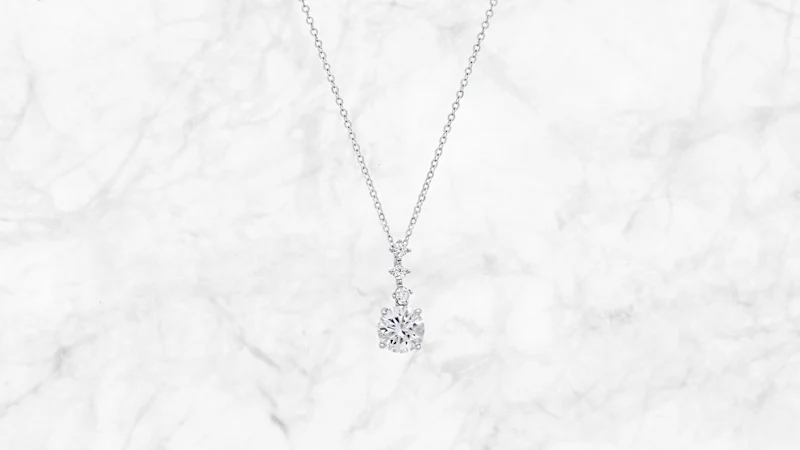 Saffron 2.0 Carat TW Moissanite Graduating Drop Pendant Sterling Silver Necklace