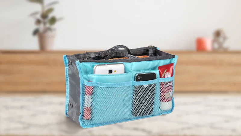 The 13-Pocket Travel Handbag Organizer