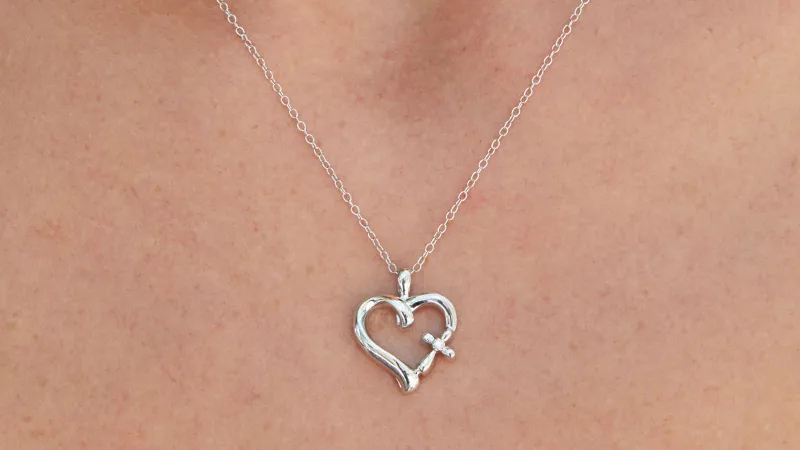 The Sterling SIlver DIamond Heart and Cross Pendant Necklace