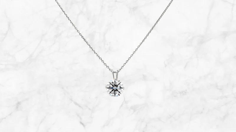 Jaclyn Smith 1/2-1/4 Carat Moissanite Solitaire Necklace with Free Chain