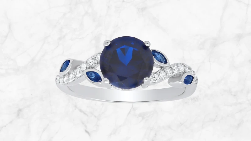 Kylie Harper Anillo Floral con Circón Cúbico Azul Zafiro