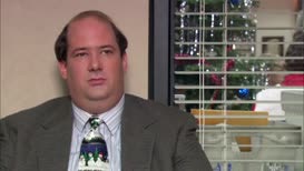 Kevin Malone saying maybe I should have taken the iPod