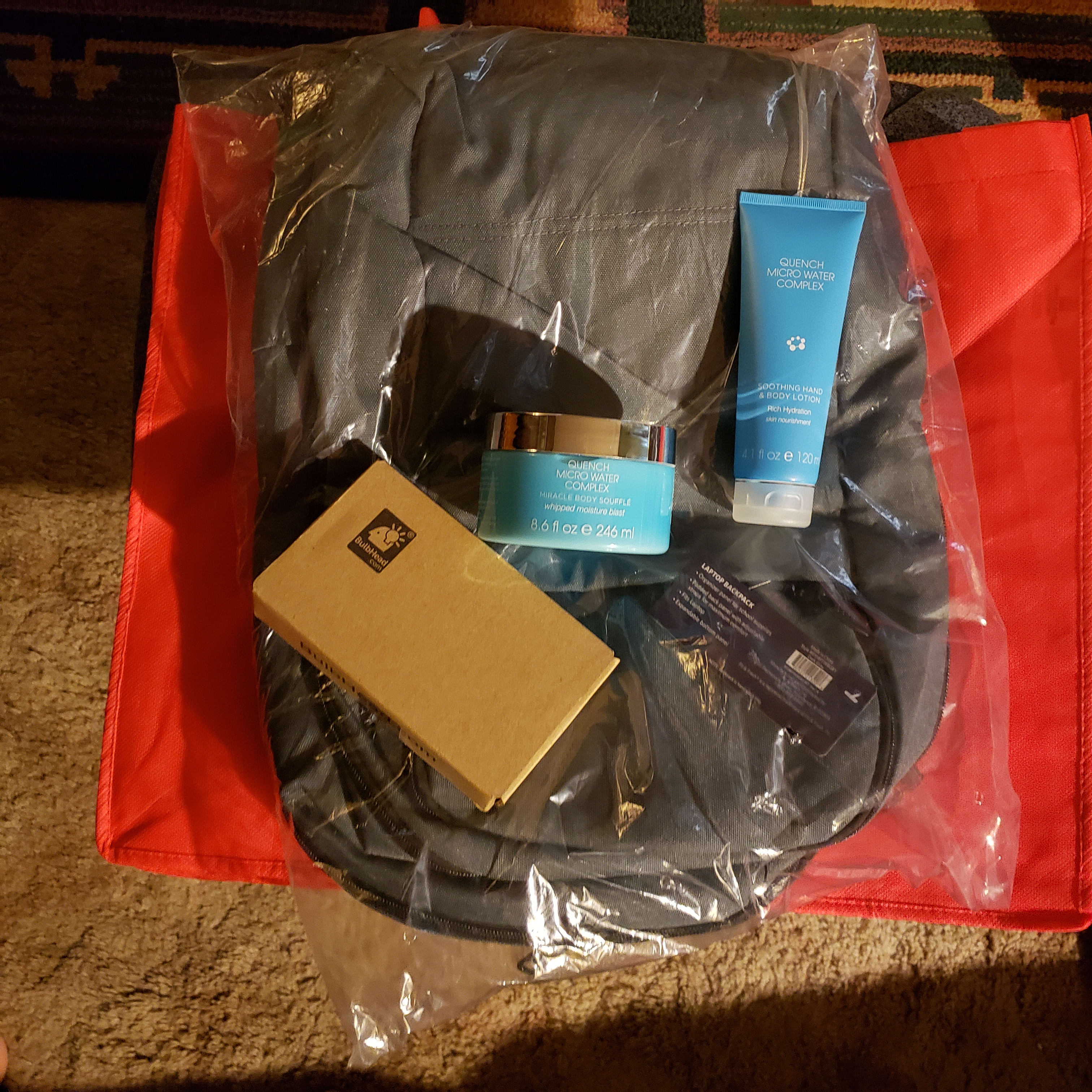 Some cosmetics, an Atomic Wallet, backpack and the ol' reliable Red tote bag. I've done worse, pretty Meh.