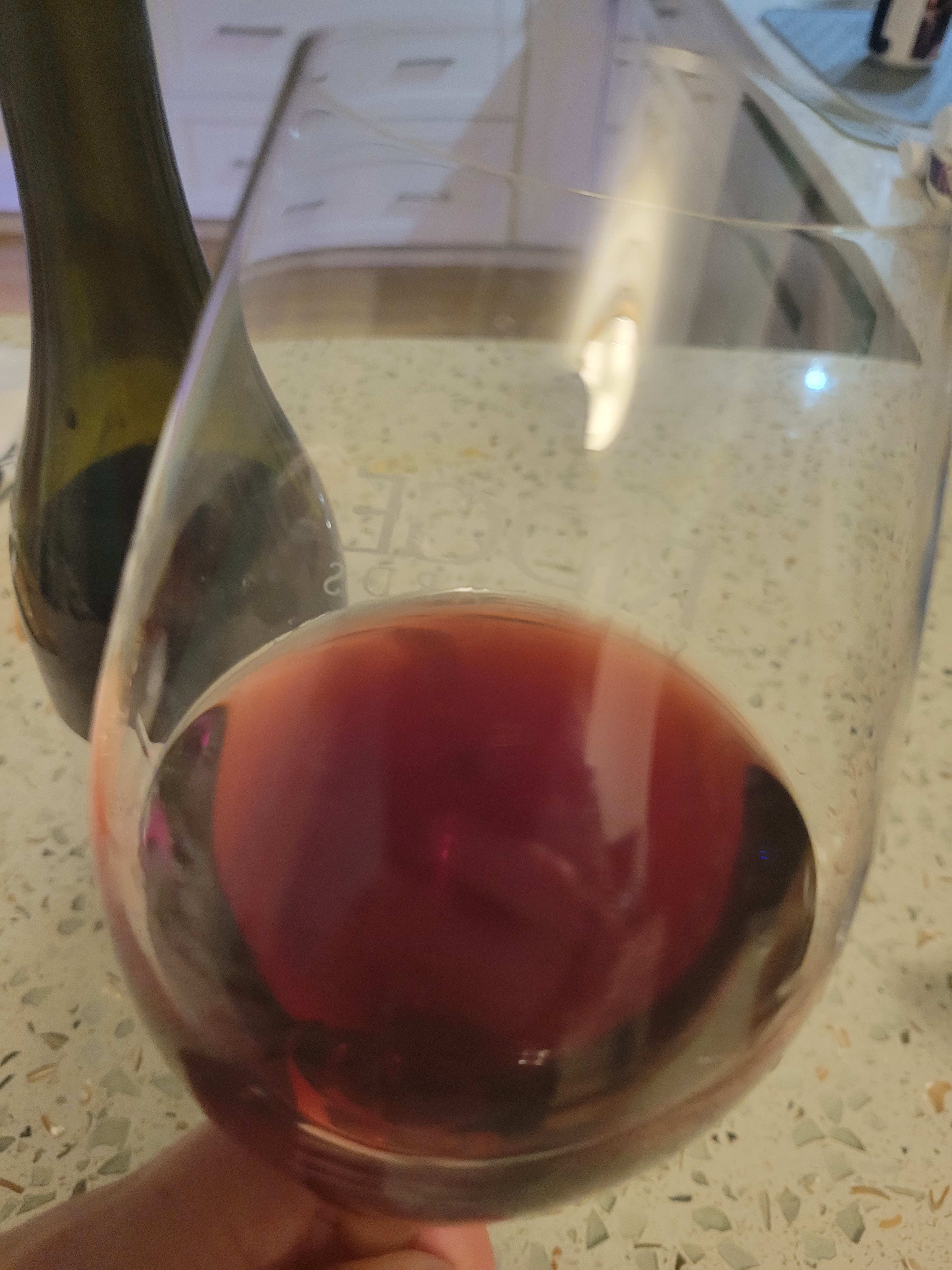 Glass and bottle of Pinot Noir