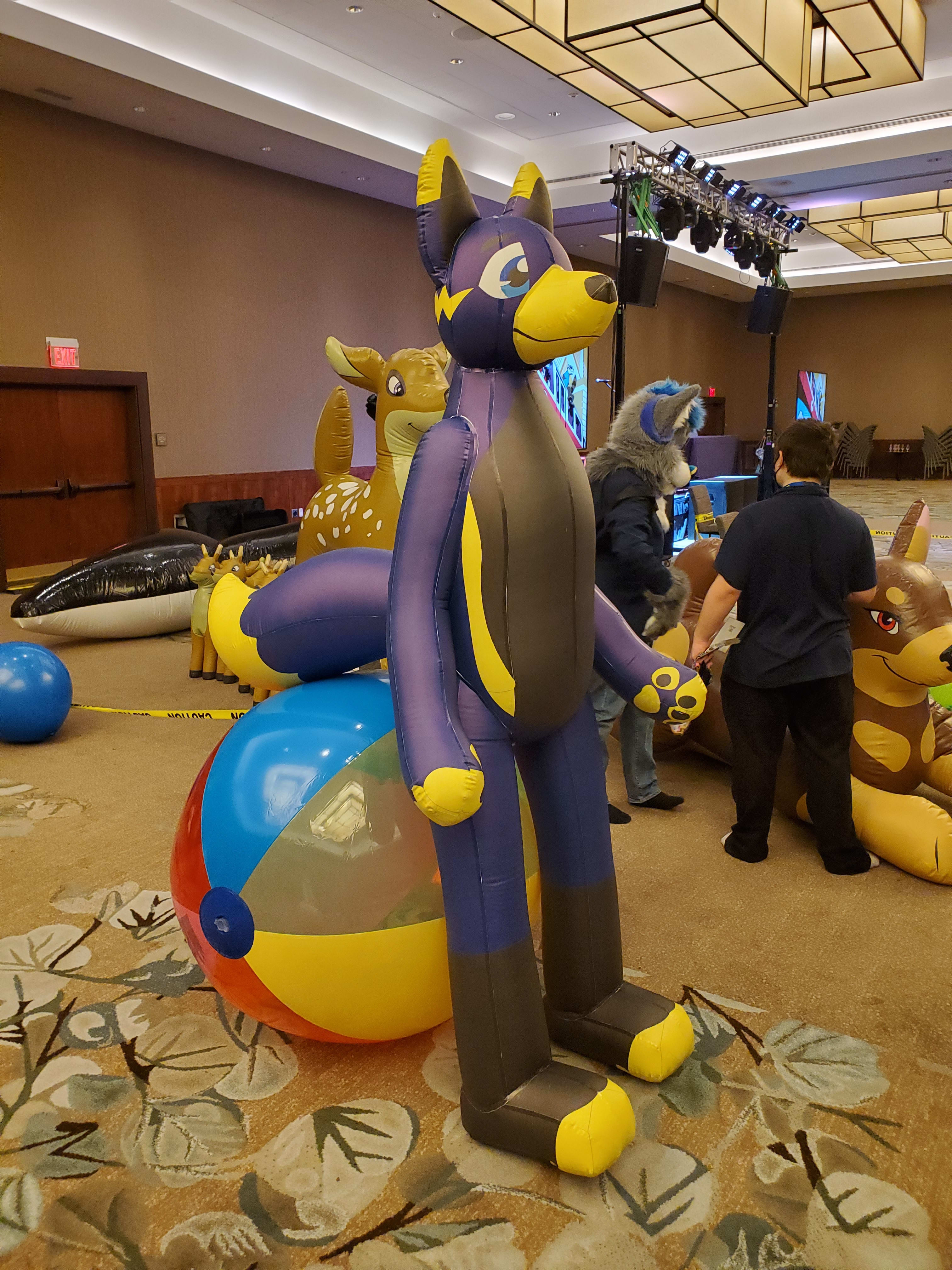 With a giant beach ball