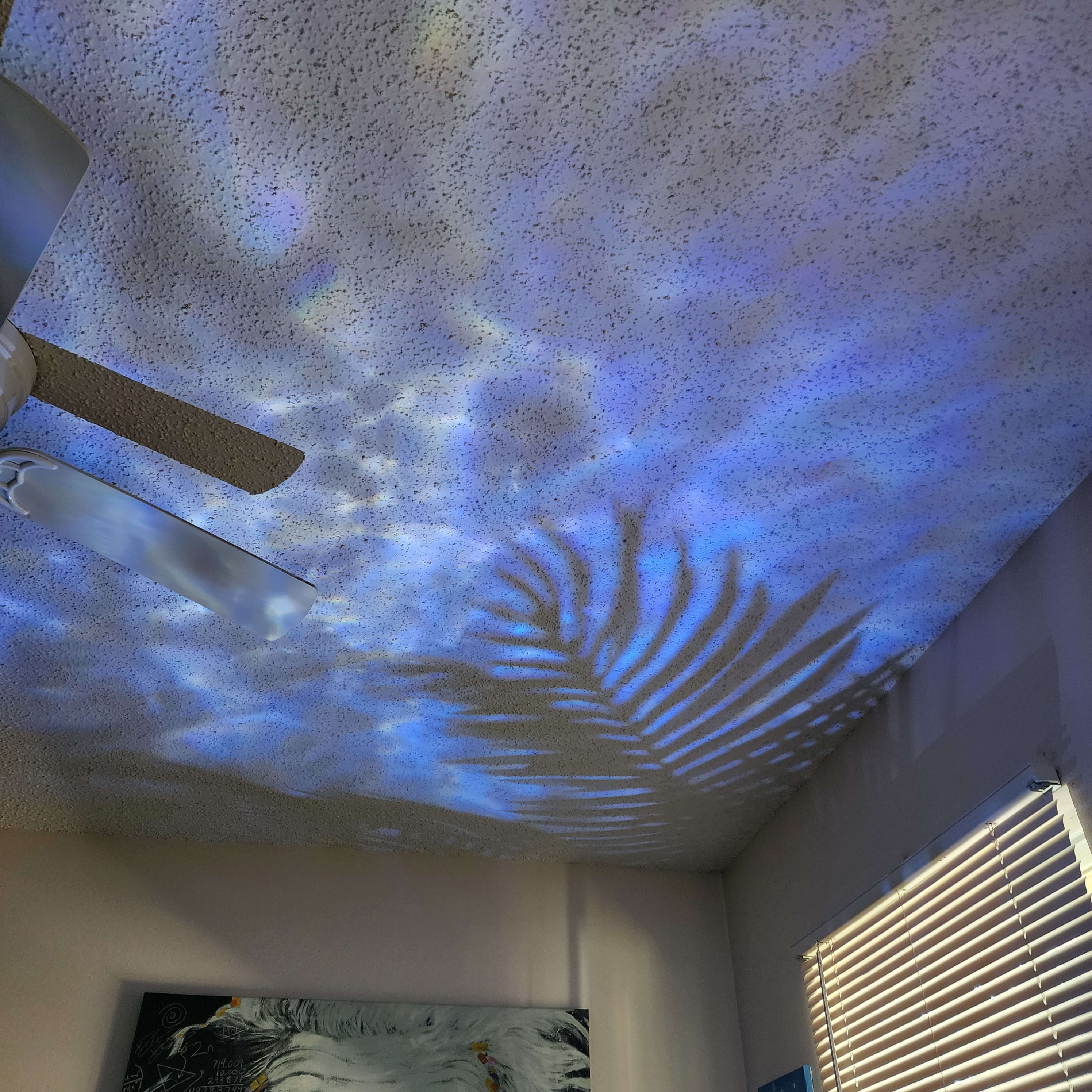 View of light projecting from floor to ceiling