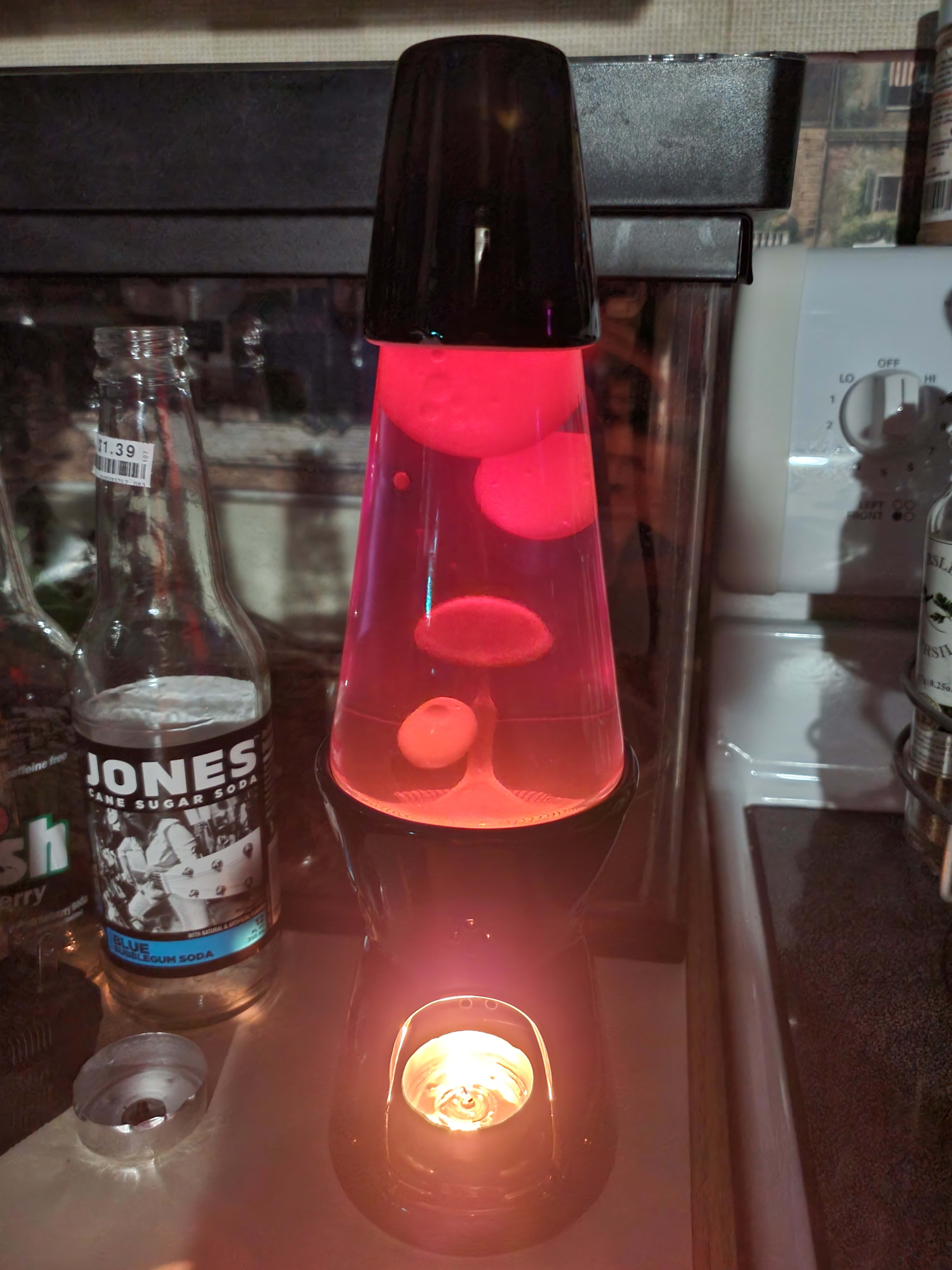 Rear view, showing tealight inside base