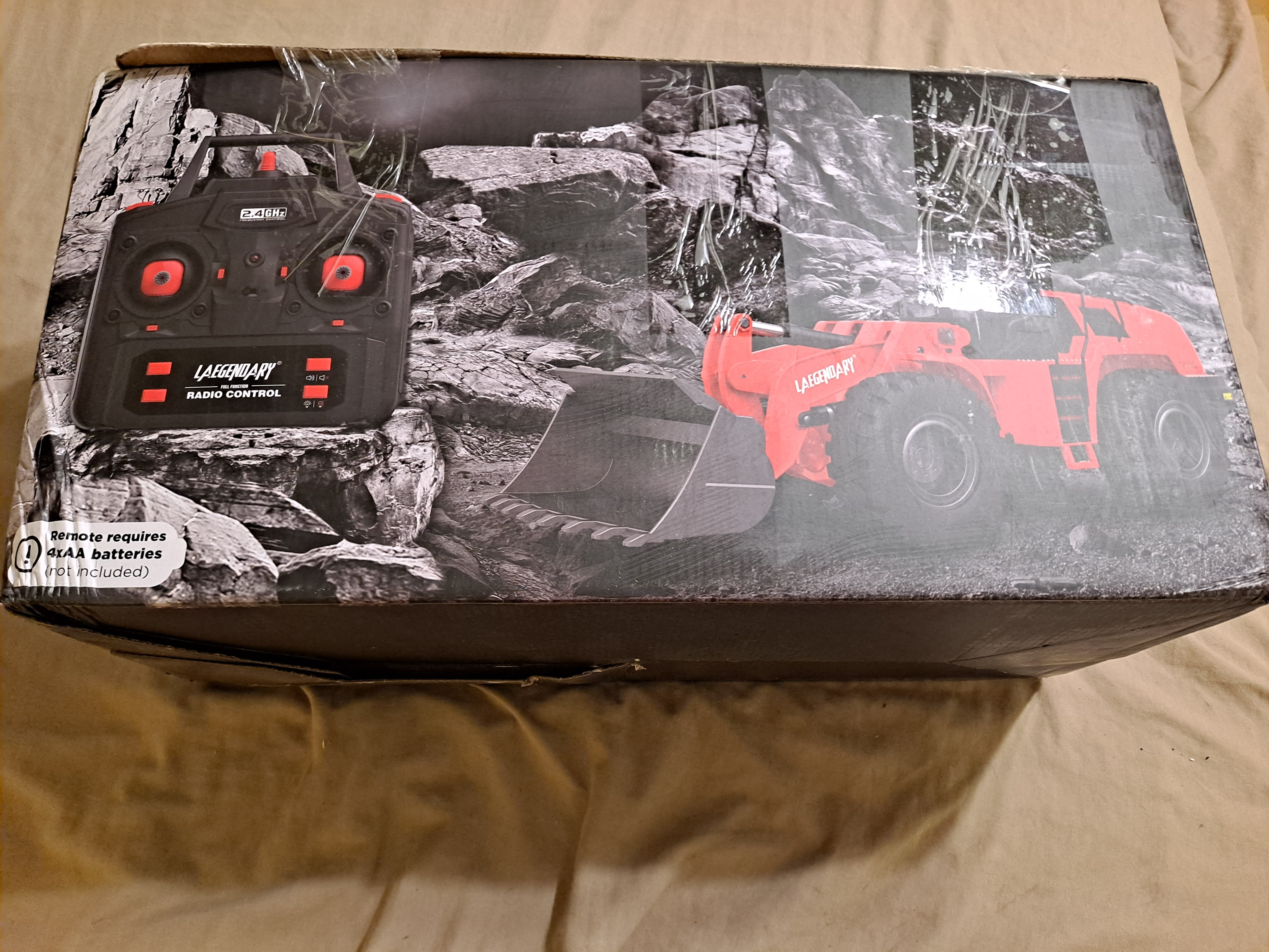 Remote control tractor. Box is heavy and very taped up at the top. I don't know what I will do with this (assuming that is what is really inside. 
