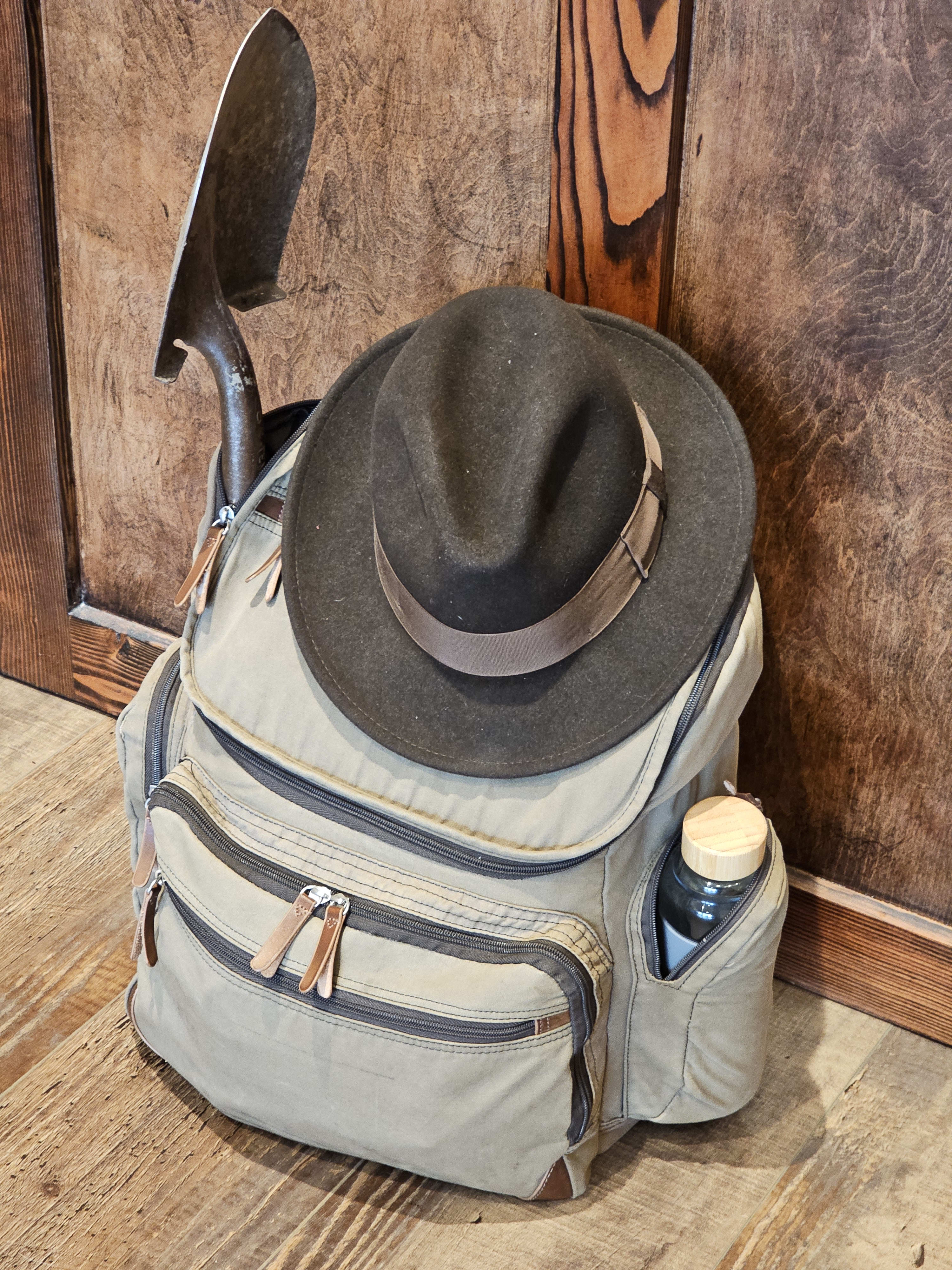 backpack and hat and shovel