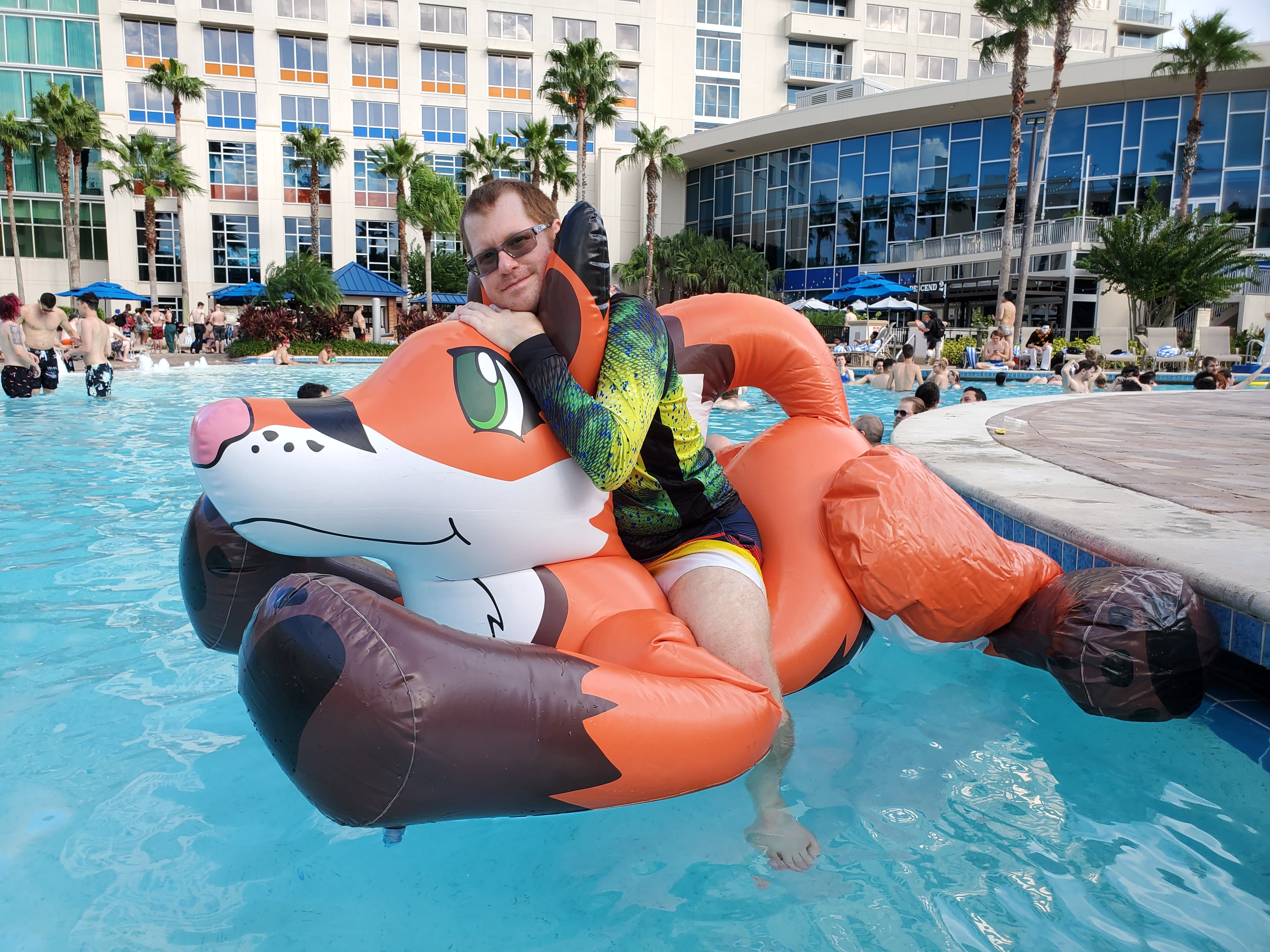 Me riding him in the Hyatt Regency swimming pool