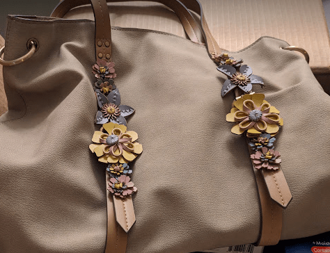 handbag with flower details