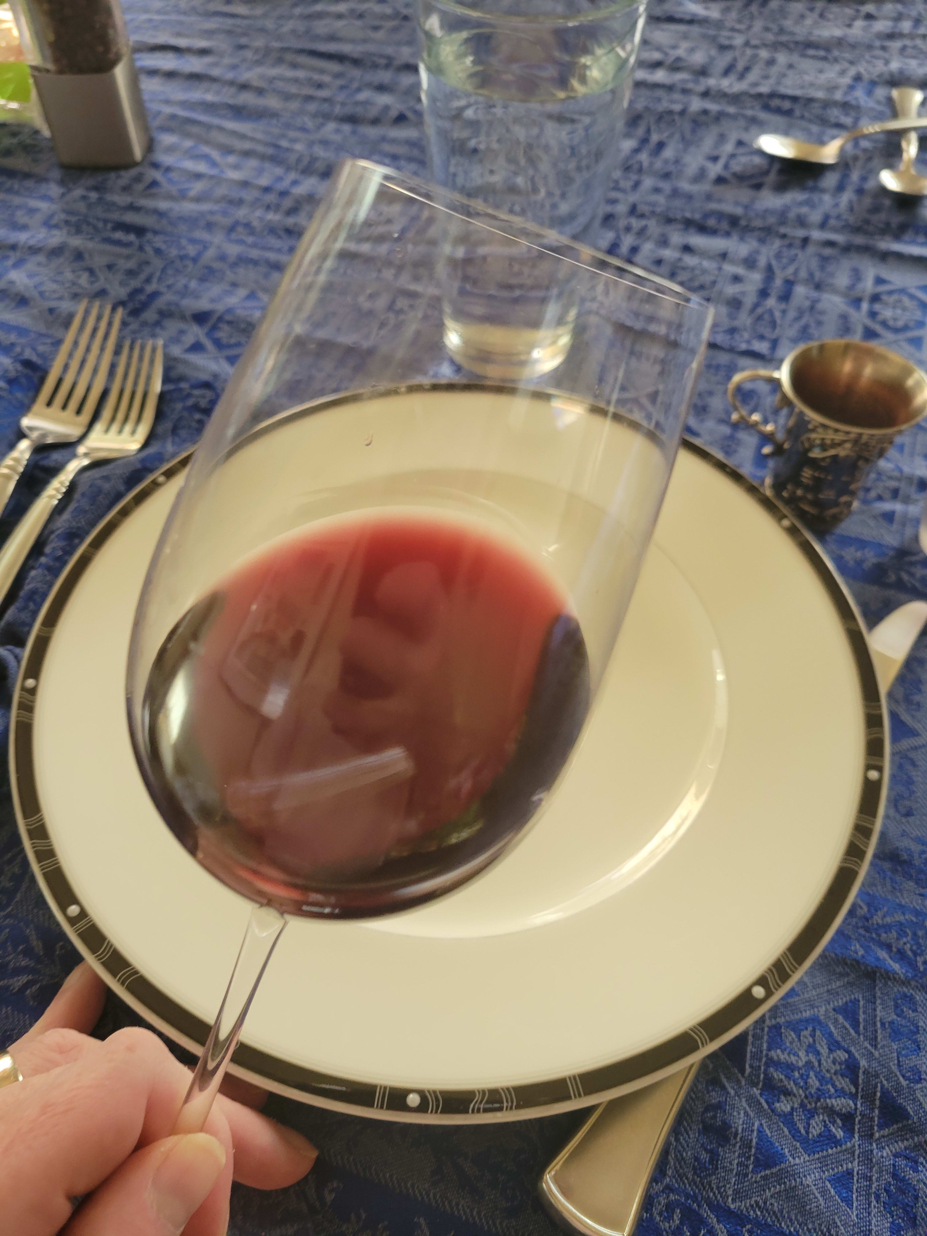 tipped wine in glass