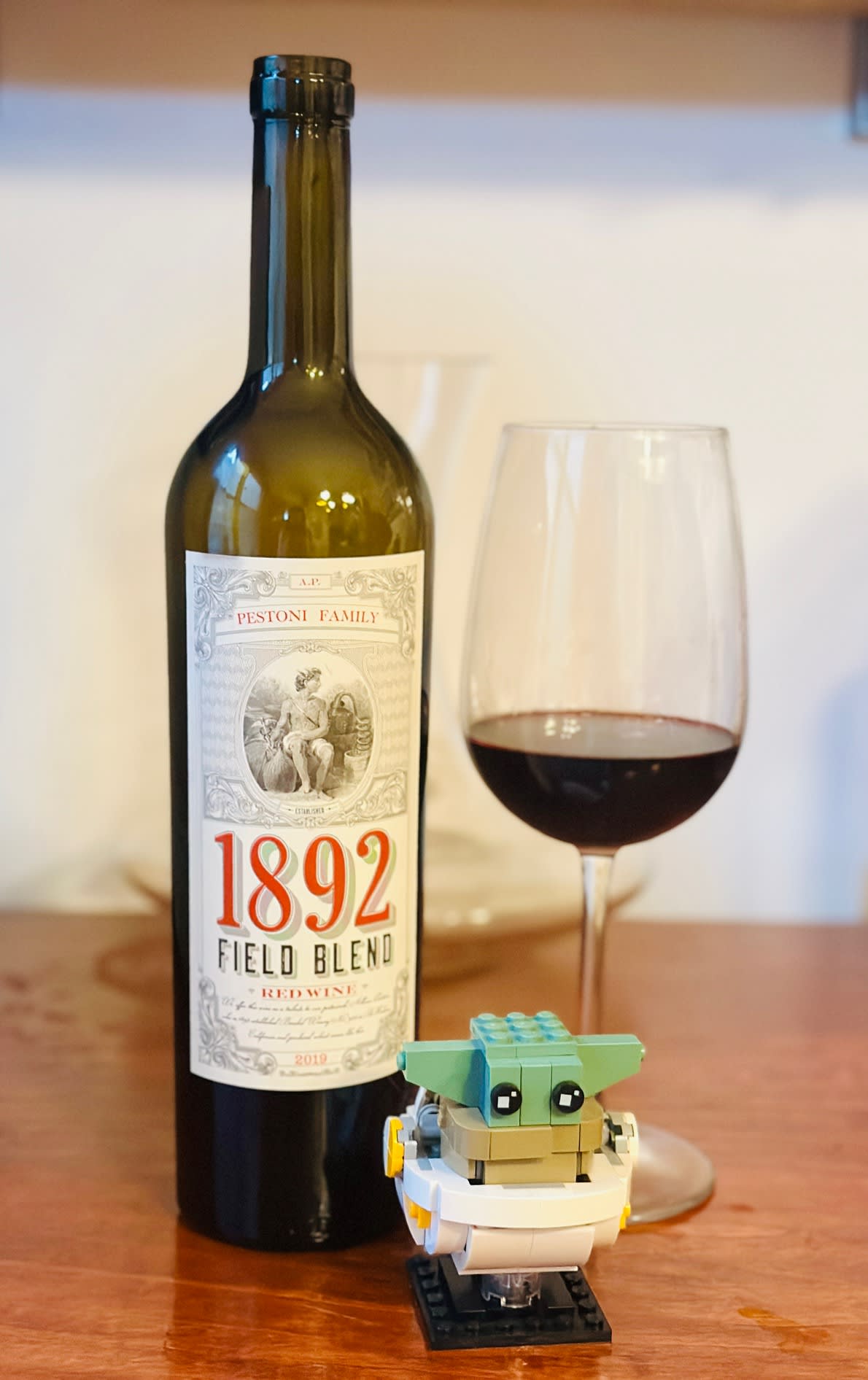 A glass of the 2019 Pestoni Family 1892 Field Blend Red Wine