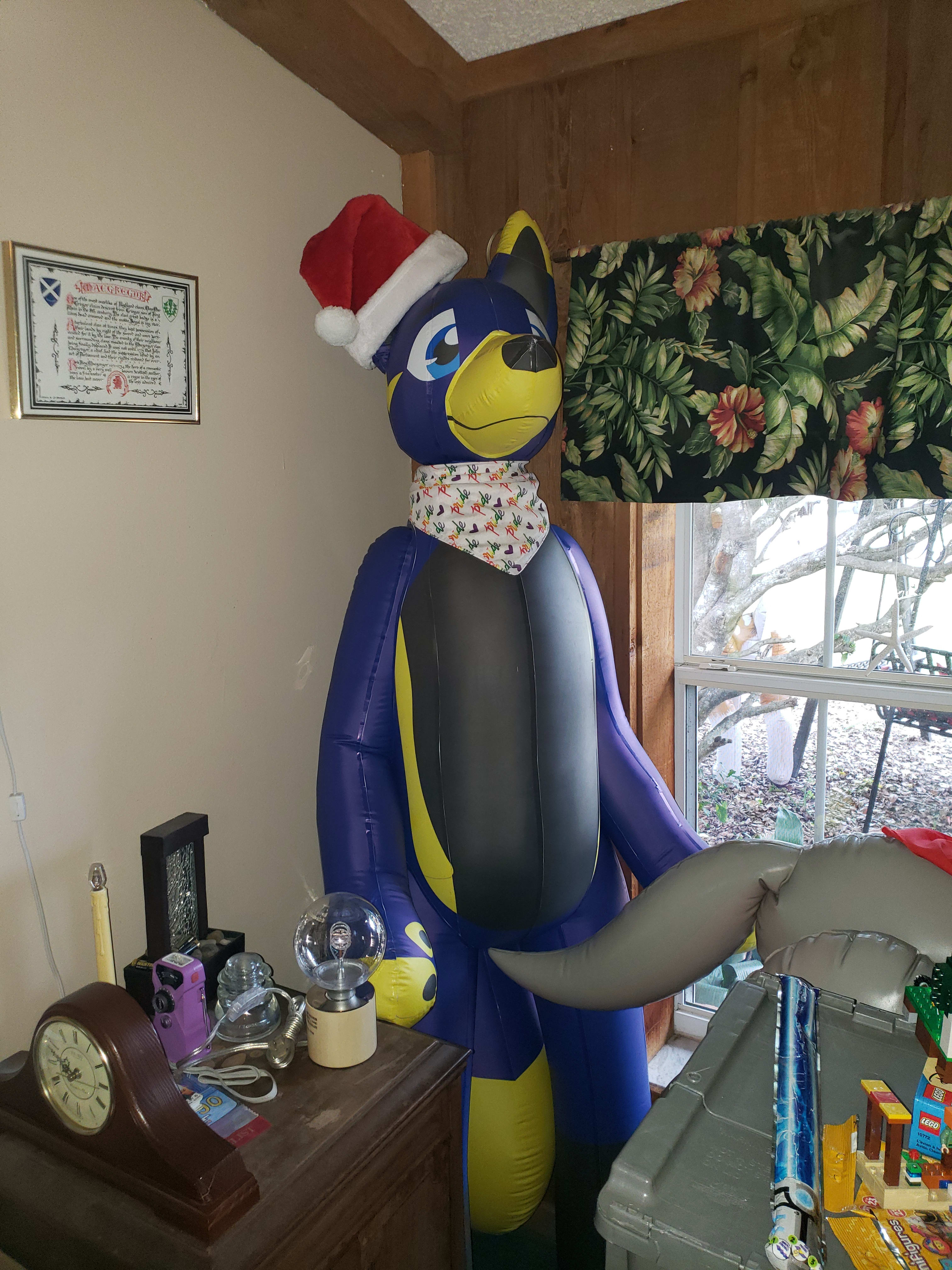 Mactoy wearing his Santa hat, too!