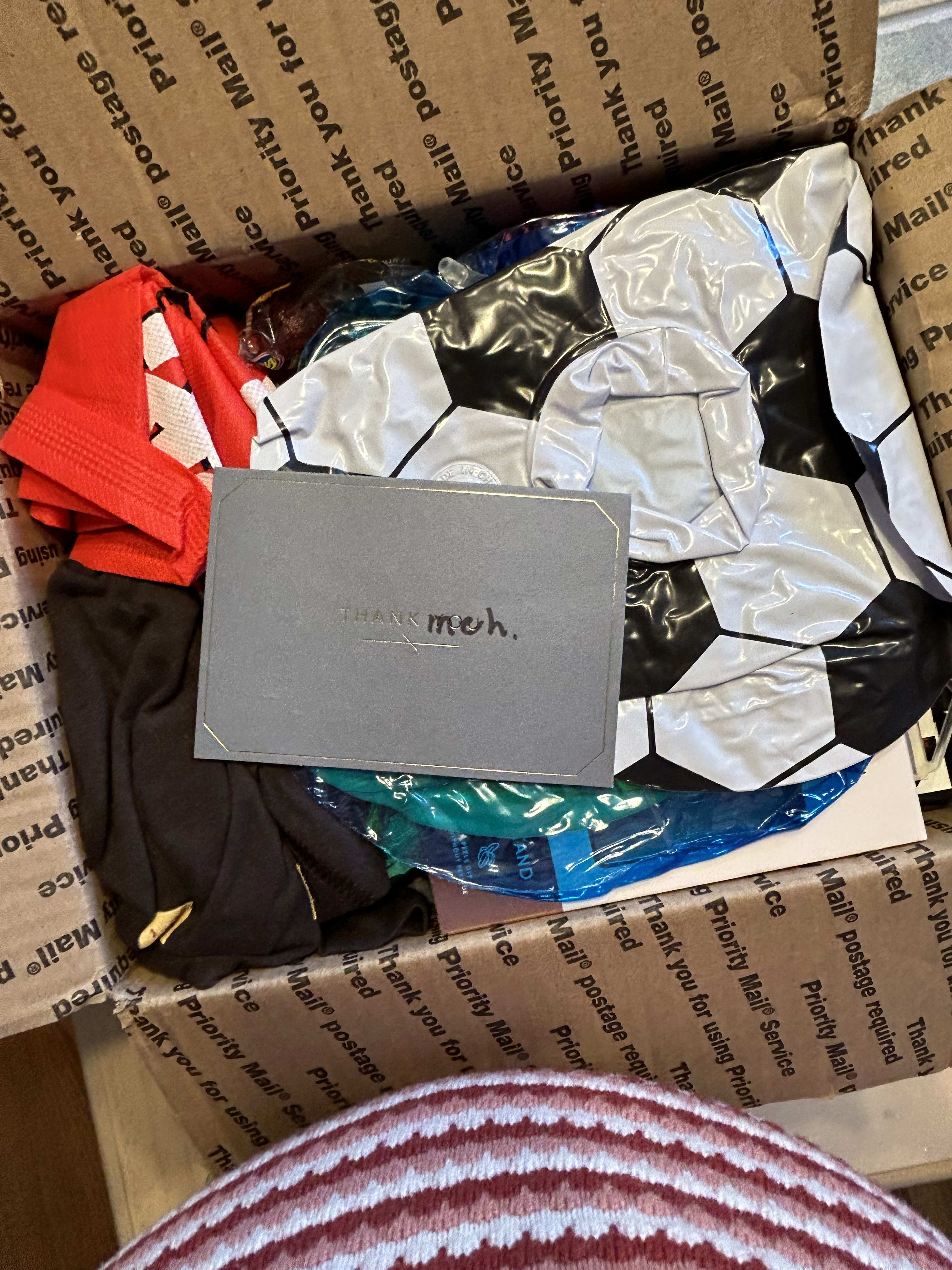 A fun little thank meh card on top of the box