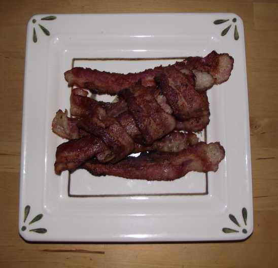 Bacon wrapped in bacon on a bed of bacon
