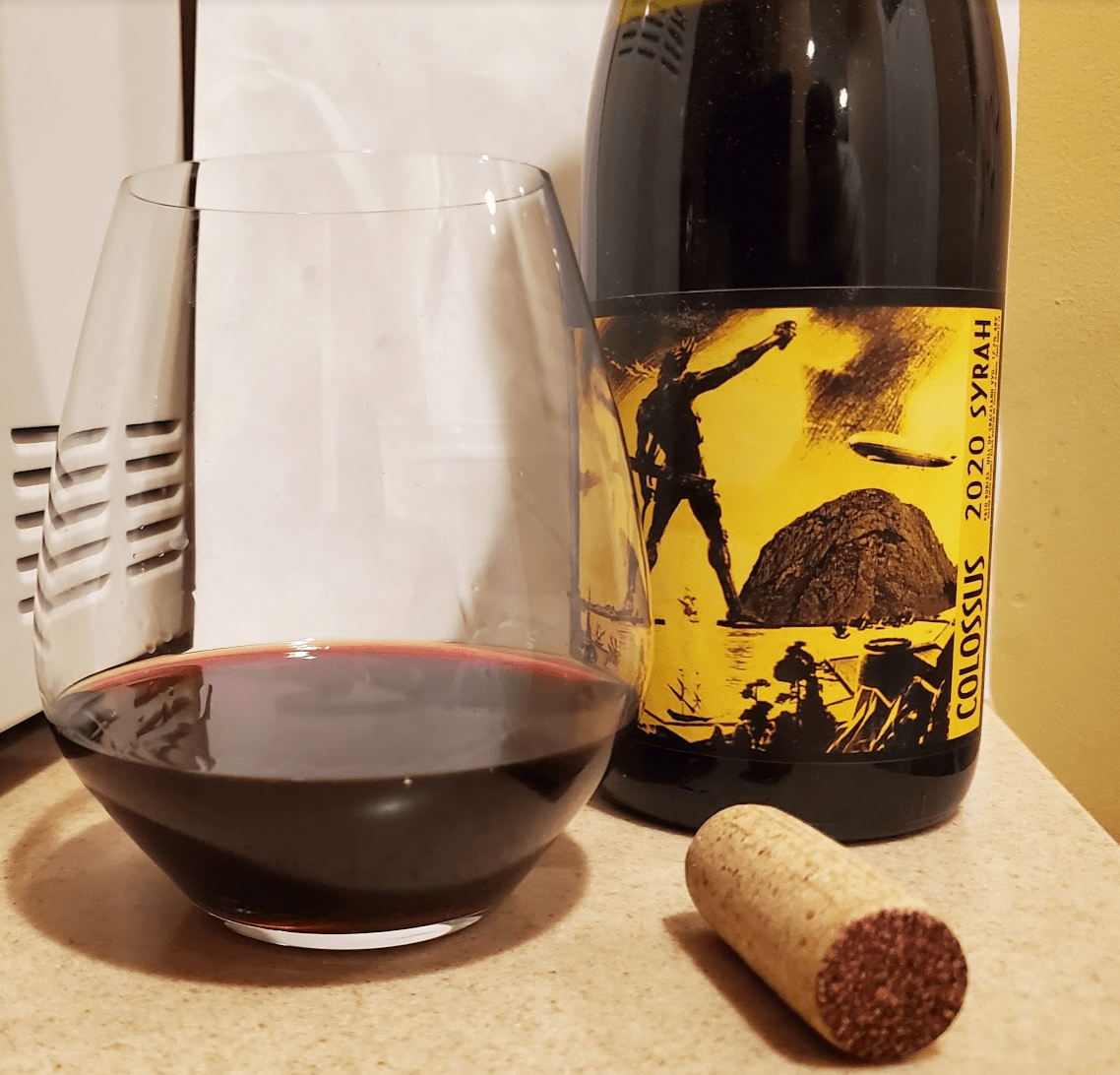 2020 Colossus Syrah bottle and glass with cork