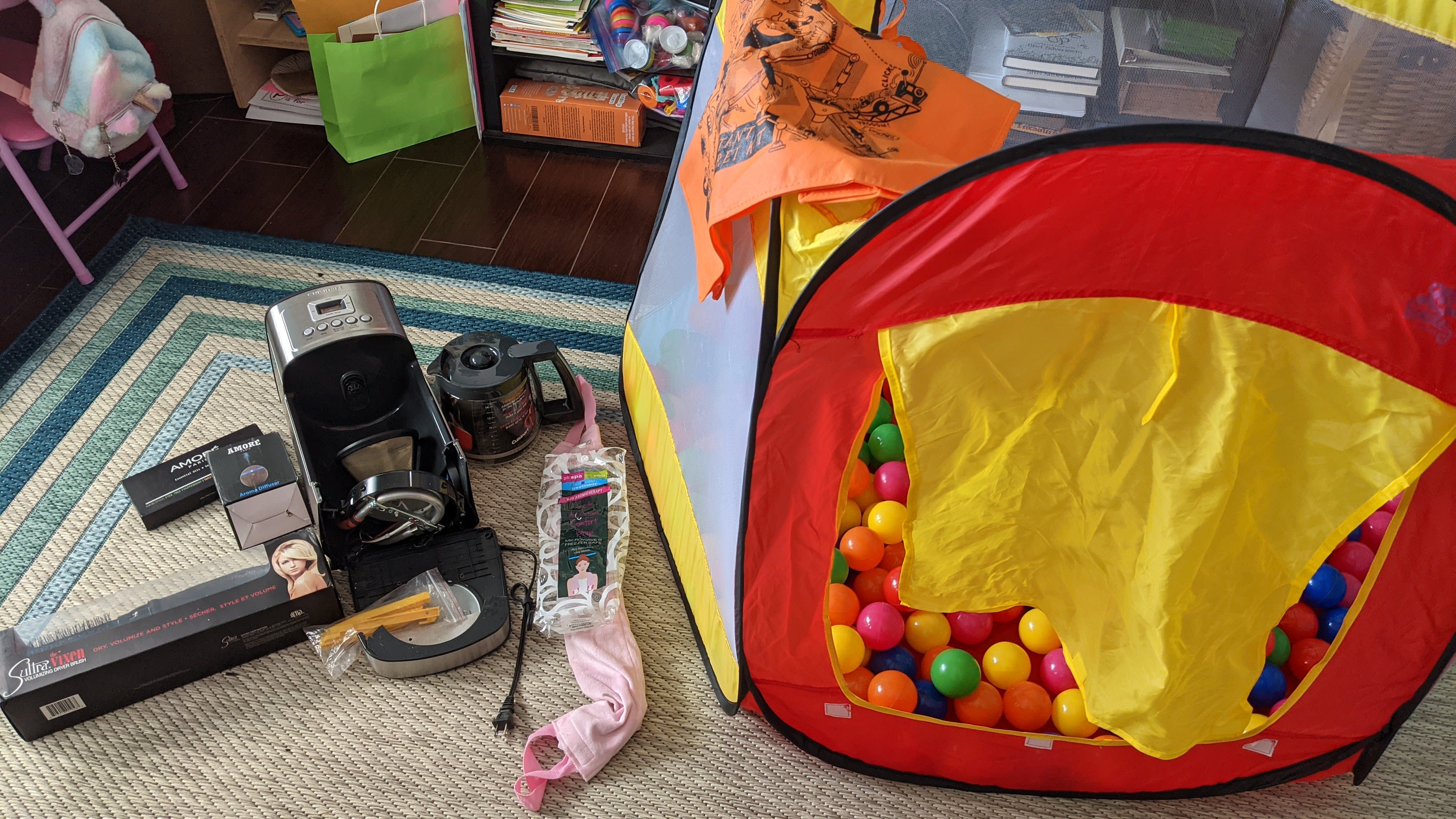 Hair Dryer Brush Thingy, Essential Oils Kit, Essential Oils Cool Mist Defuser, Neck Heat/Cool Thingy, A tragically broken coffee maker, an IRK bag, and.... A FLIPPIN' BALL PIT!!!!