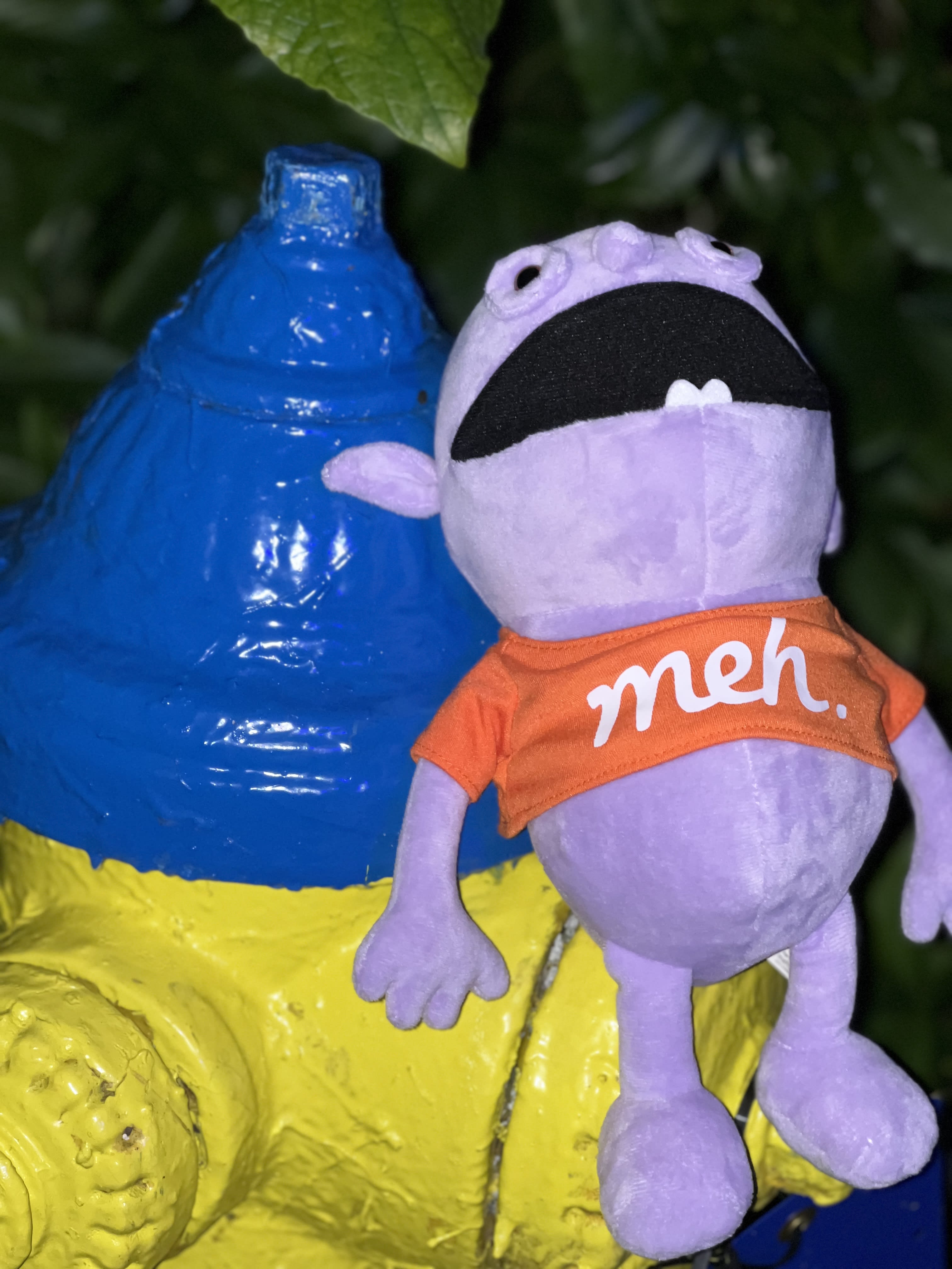 Stuffed Irk Feeling Stuffed on A Fluorescent Fire Hydrant