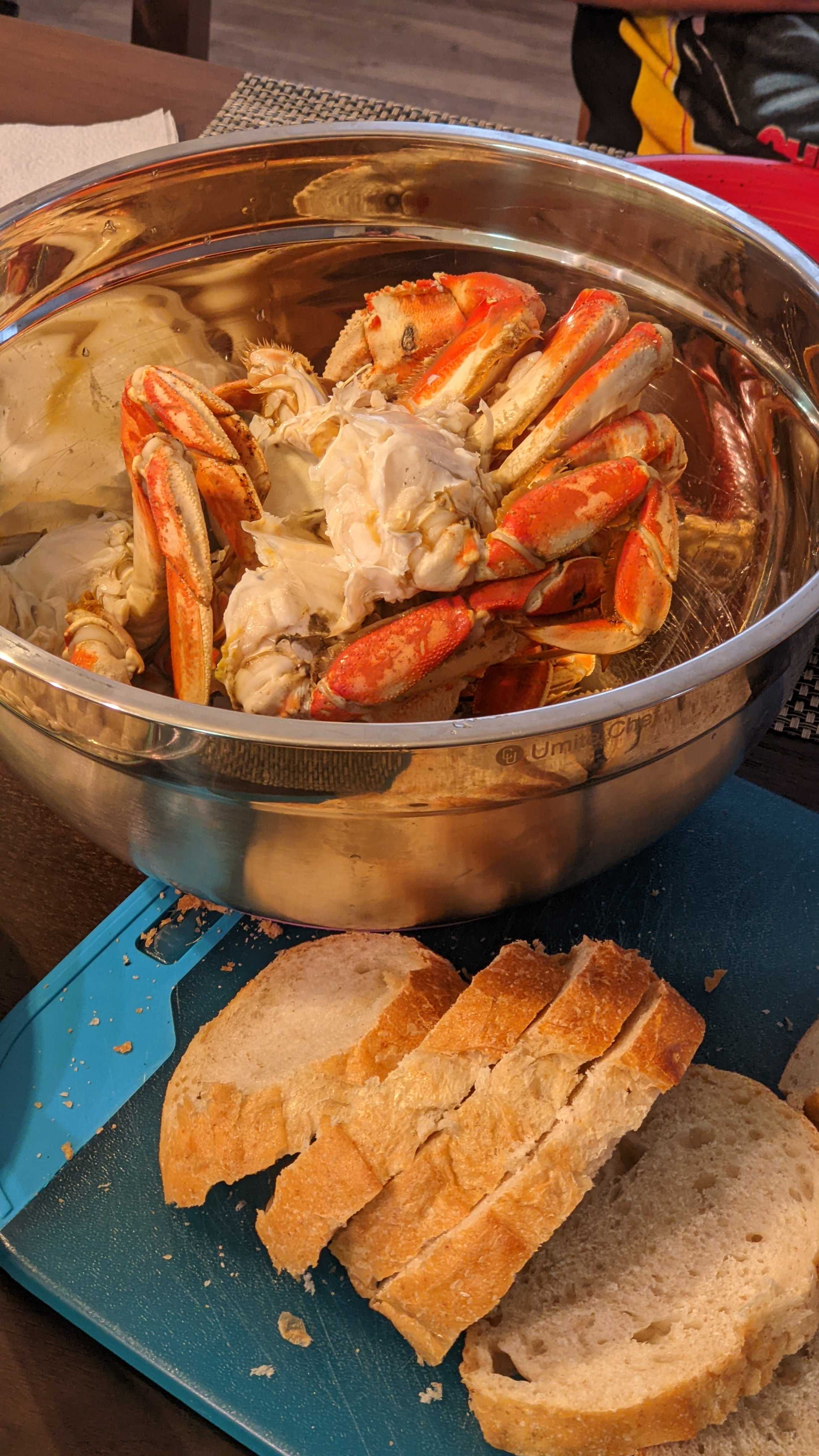 Cooked crab and bread on a table