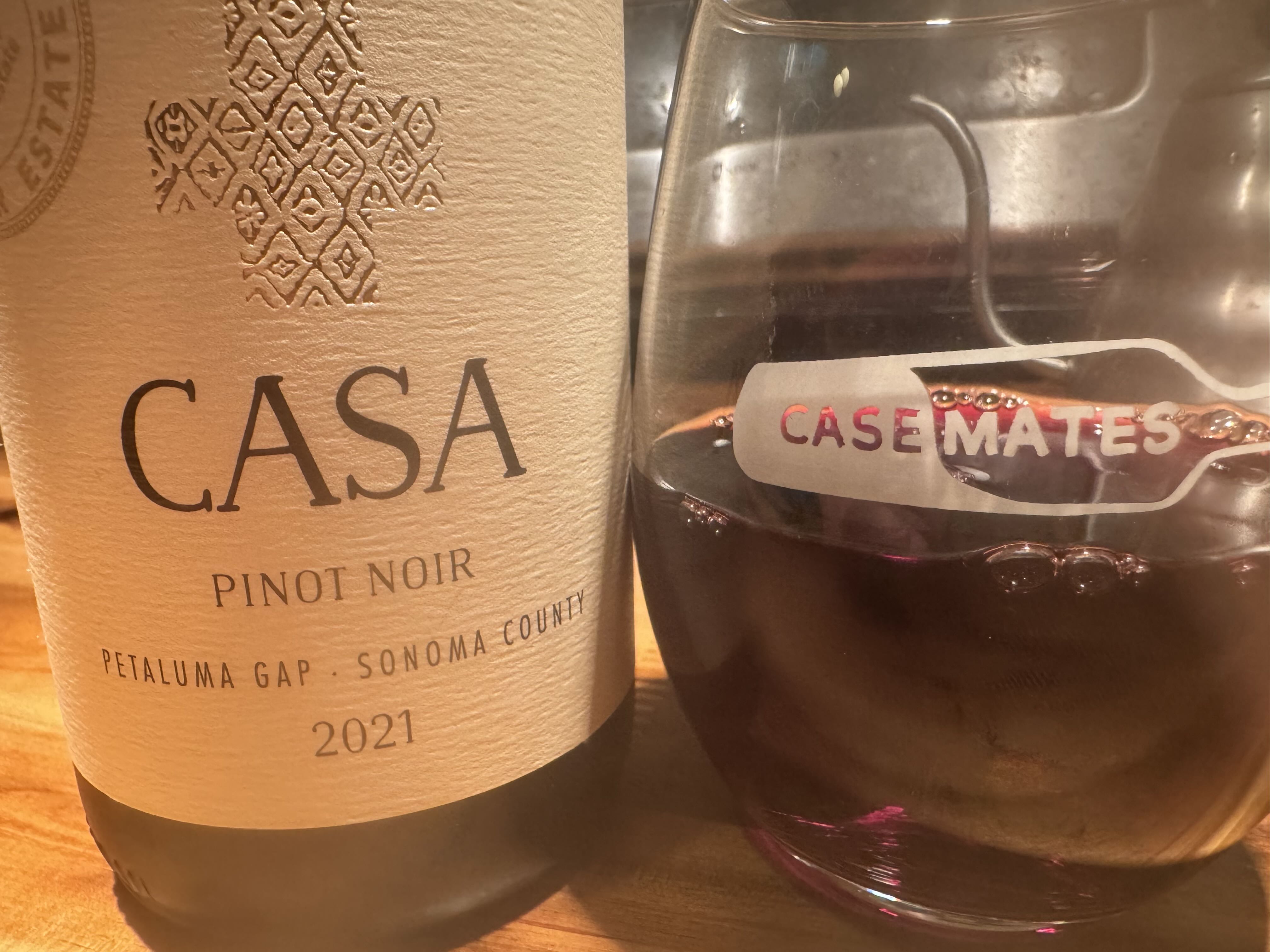 Bottle&Glasswithalotoffrigginspots