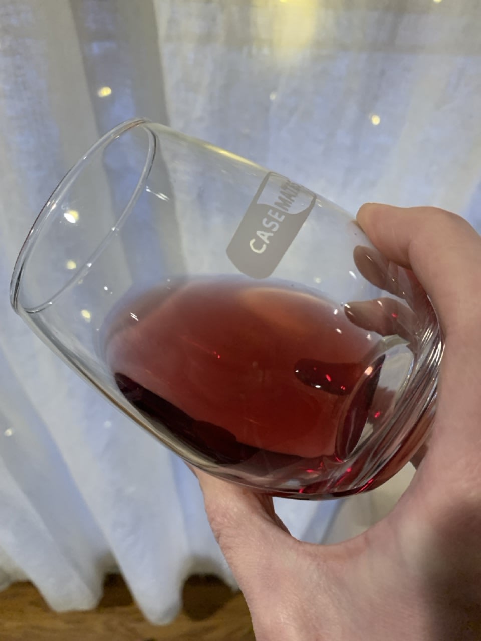 Red Electra Moscato in tilted glass