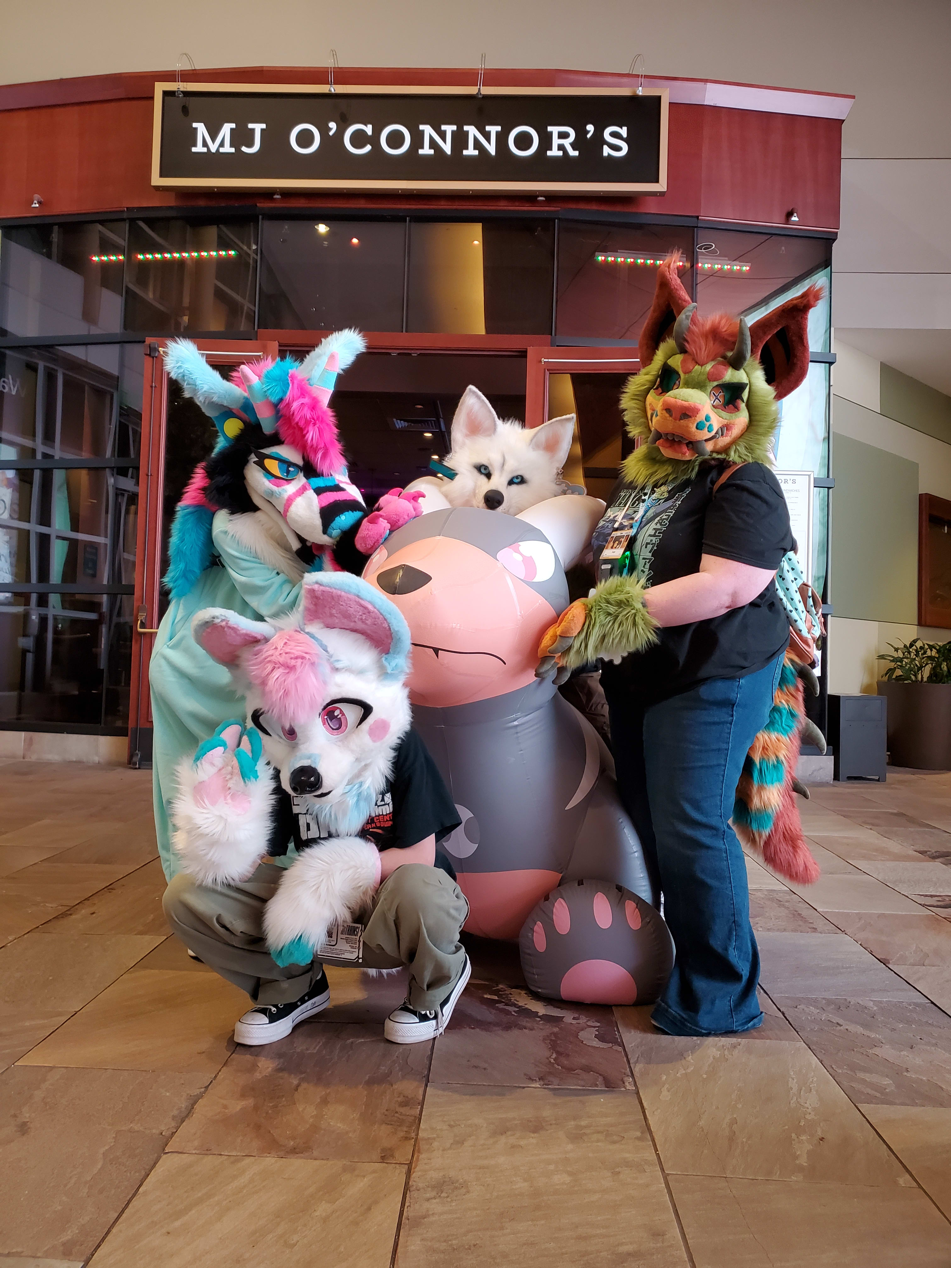 Fursuiters pose with Vulcan, my giant inflatable Houndoom.