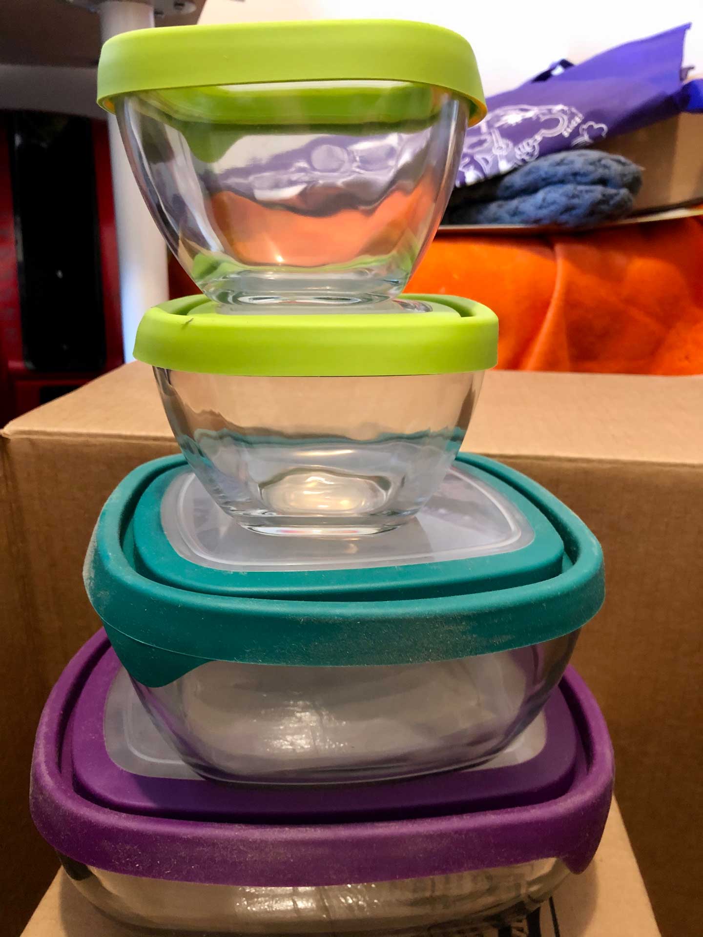 Glass bowl things with Tupperware-like lids — dusty but in good condition