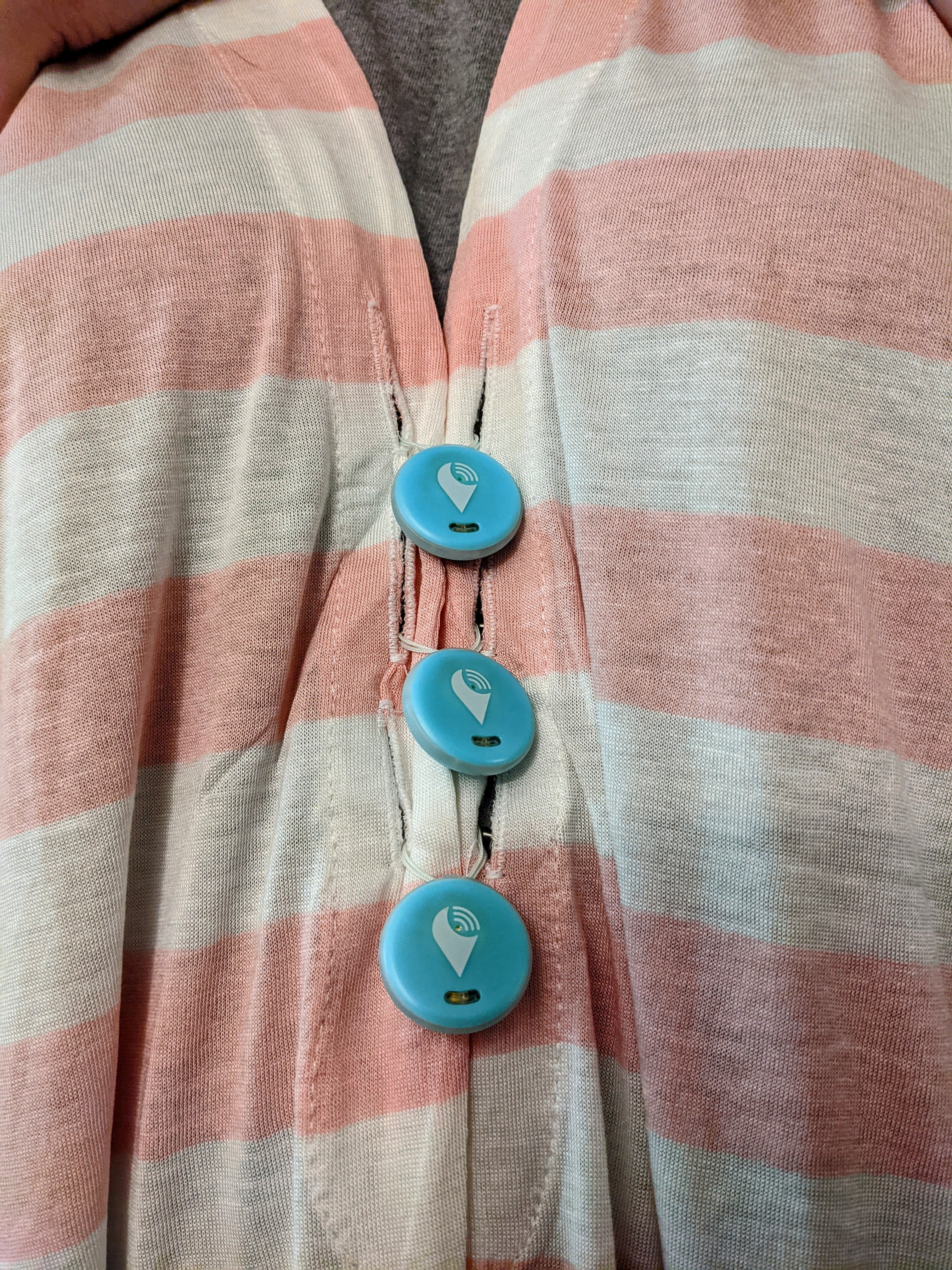 poncho with "buttons"