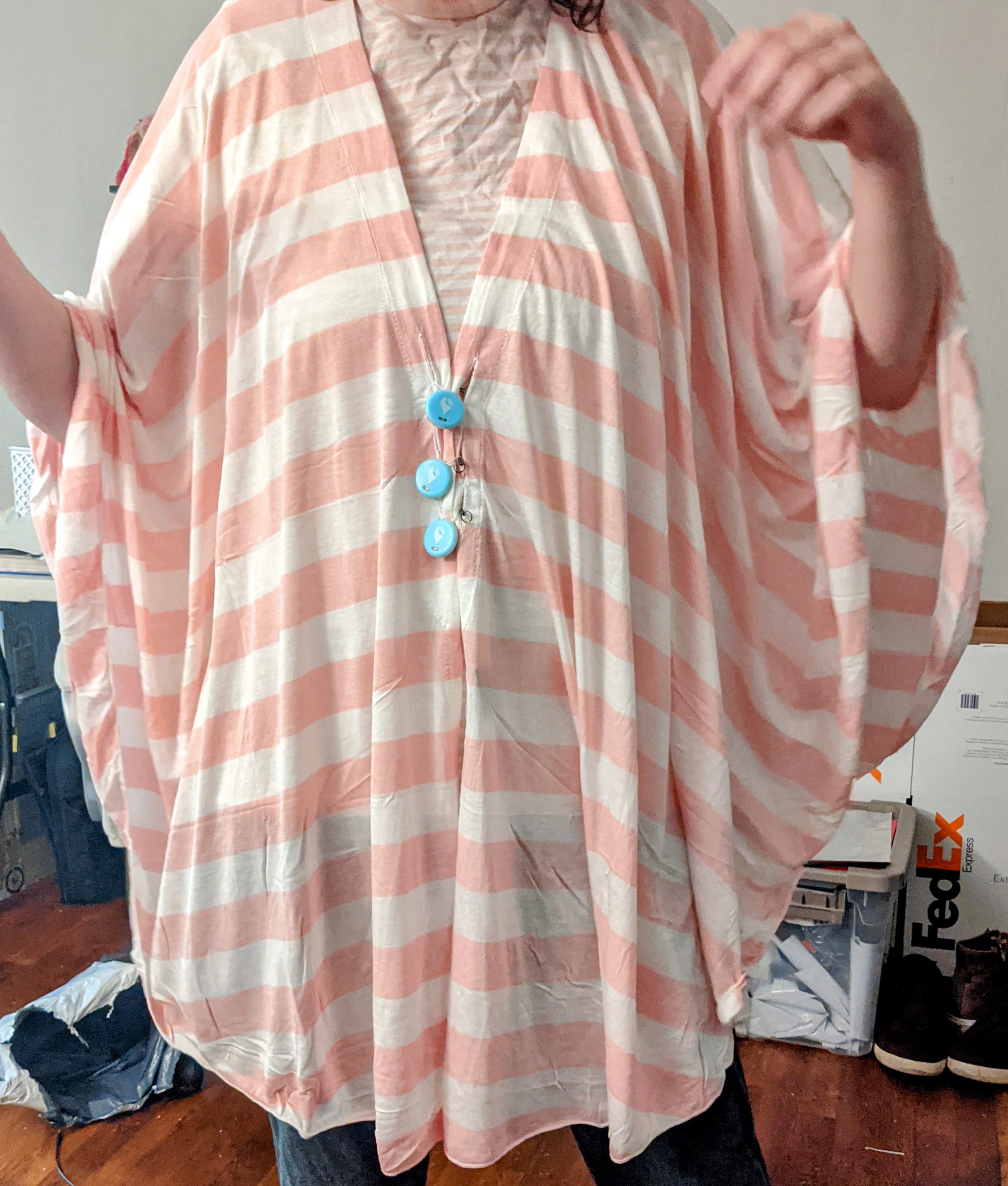 poncho with "buttons"