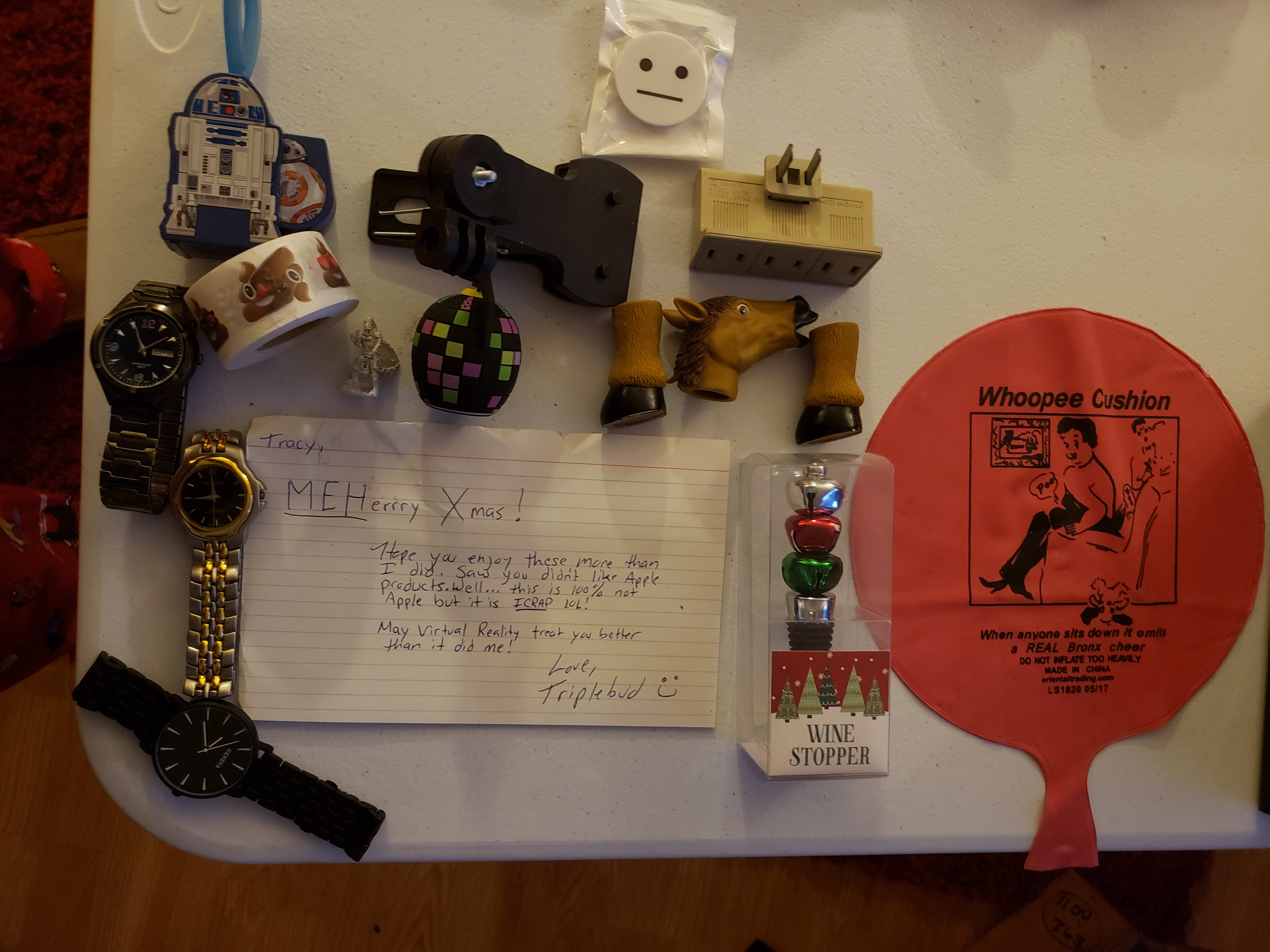 Here's the main group: R2D2 & BB8 keychain; MEH button holder; Clip bracket?; 3:1 AC outlet; 3 watches needing batteries; Small centurion?; Bitty Boomer; 3 pieces of ass :) ; Holiday Wine Stopper and a Whoopie Cushion!