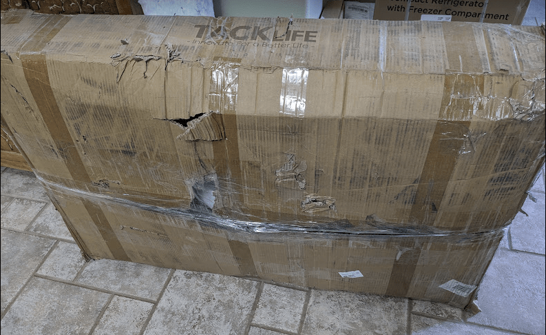 large box with a lot of packing tape