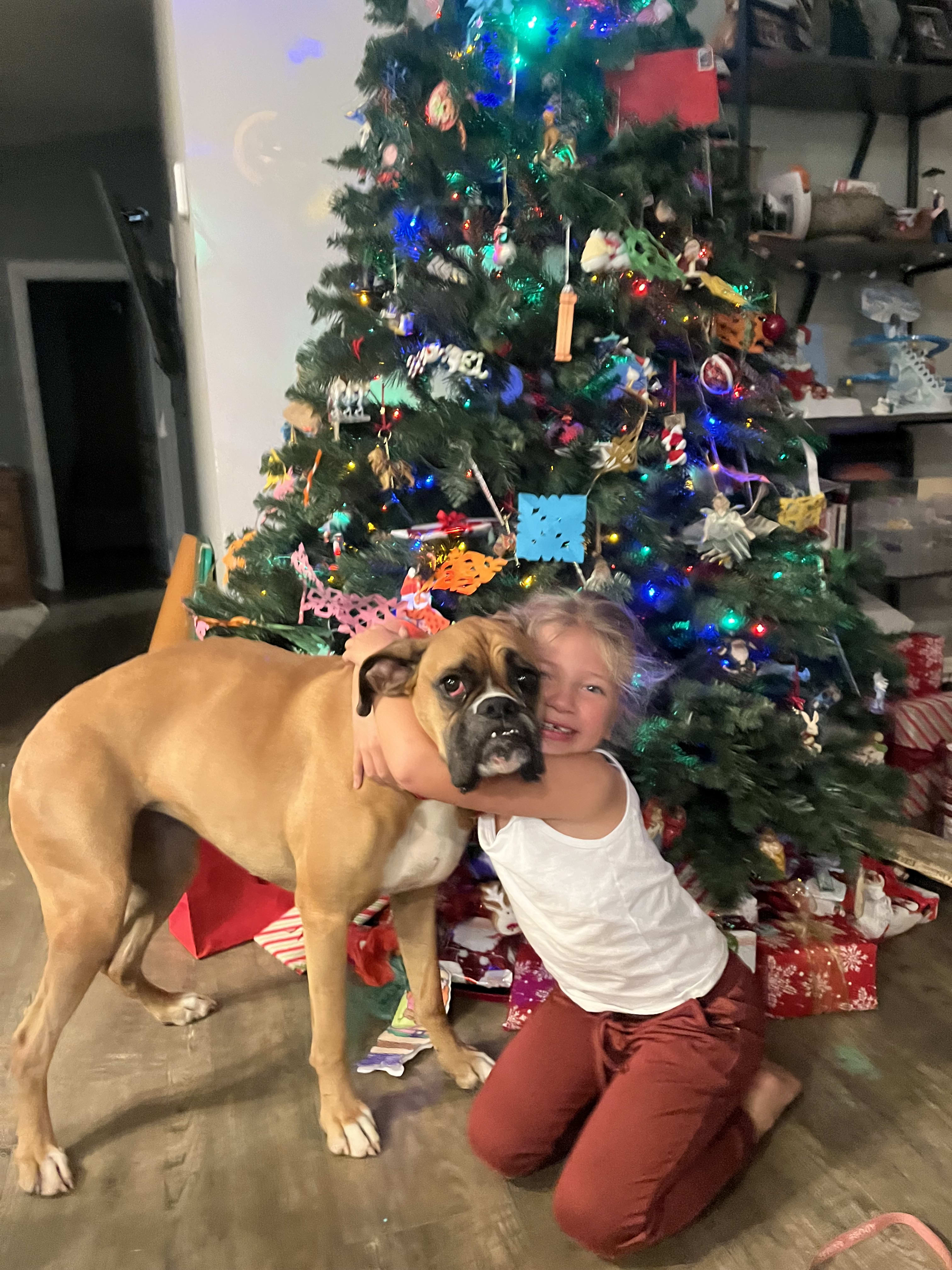 warm greetings from a barefoot 6-year-old and her tolerant fawn companion