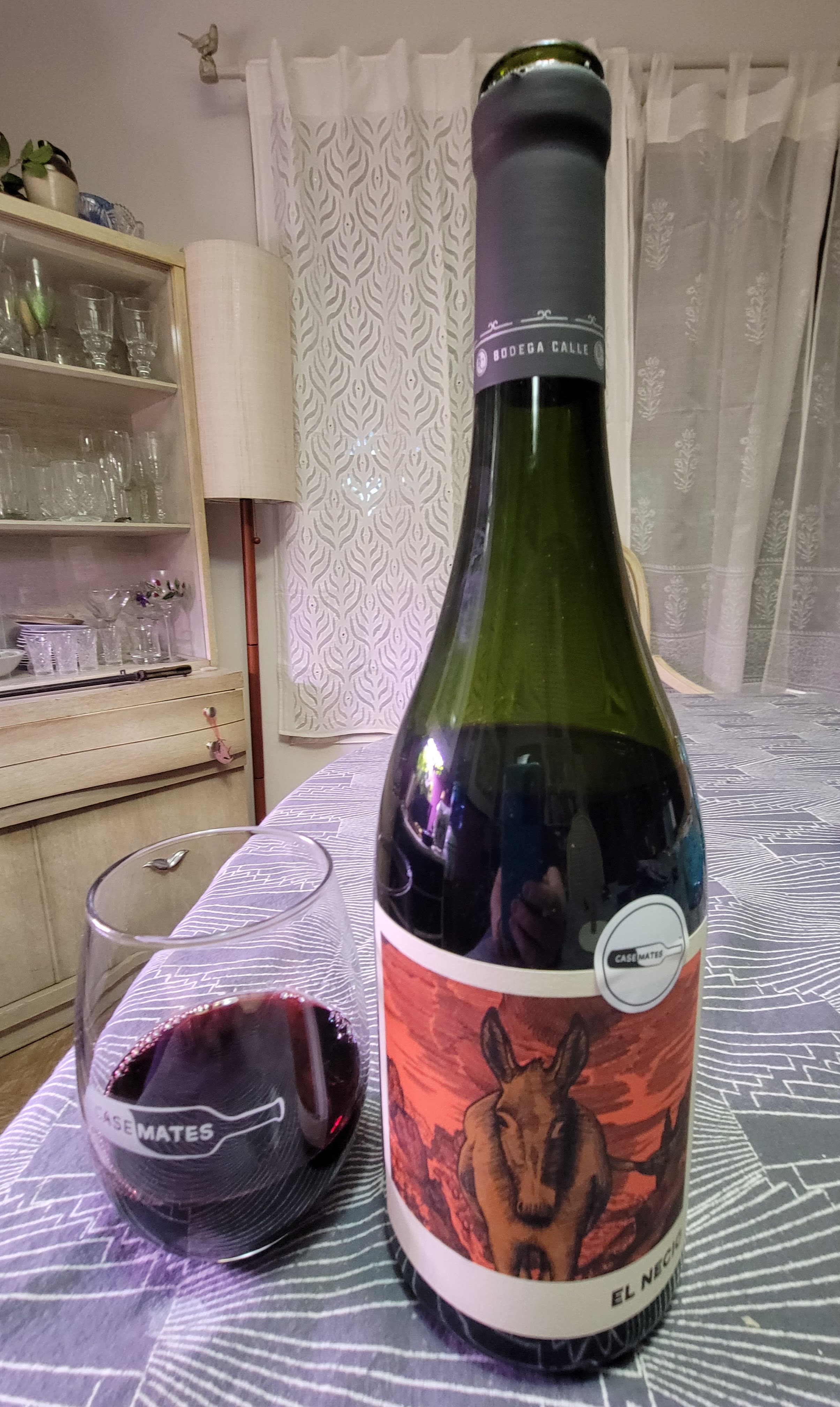 El Necio Bottle and Casemates wine glass
