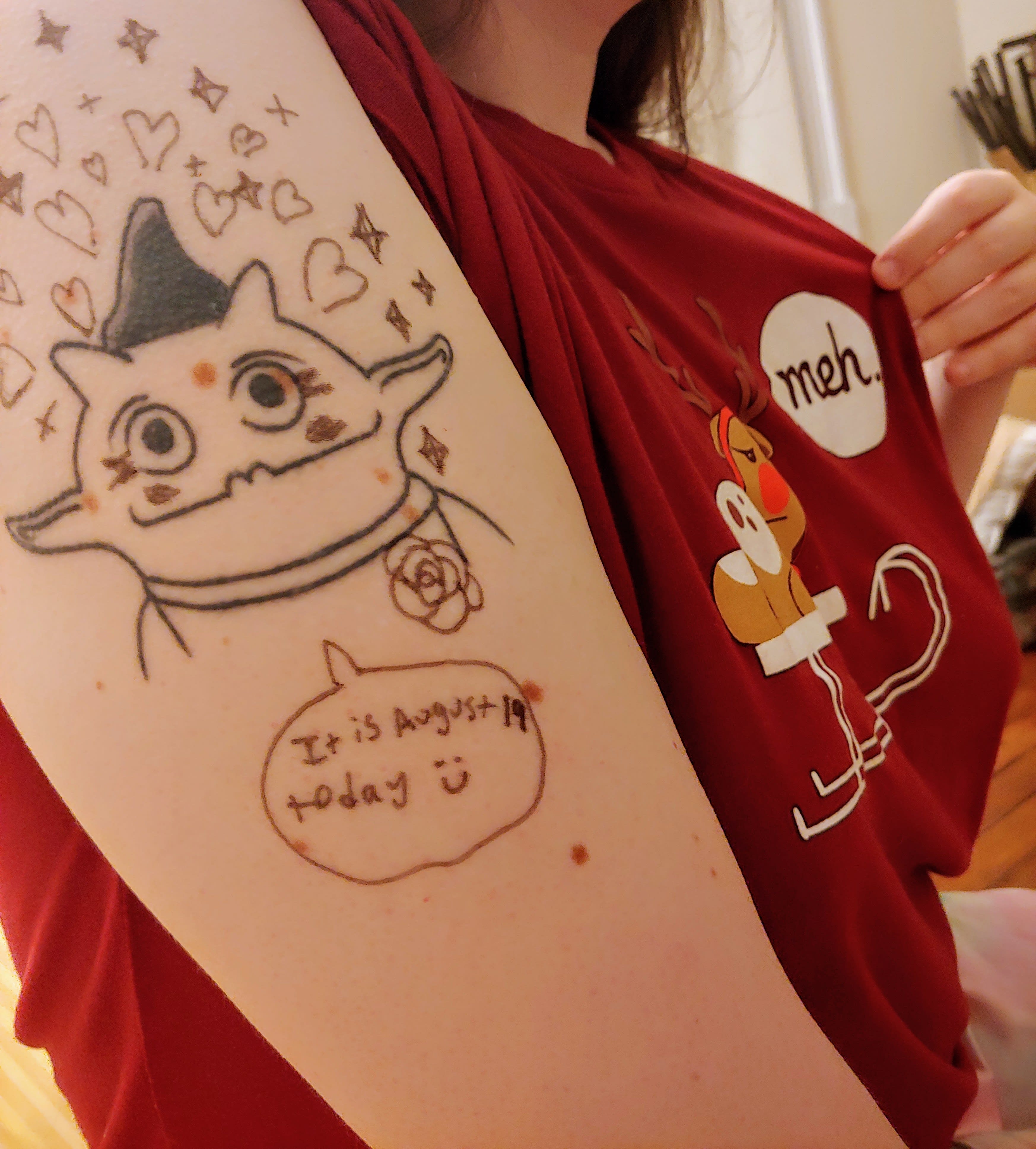 photo of Irk tattoo, doodled on, with a Meh shirt