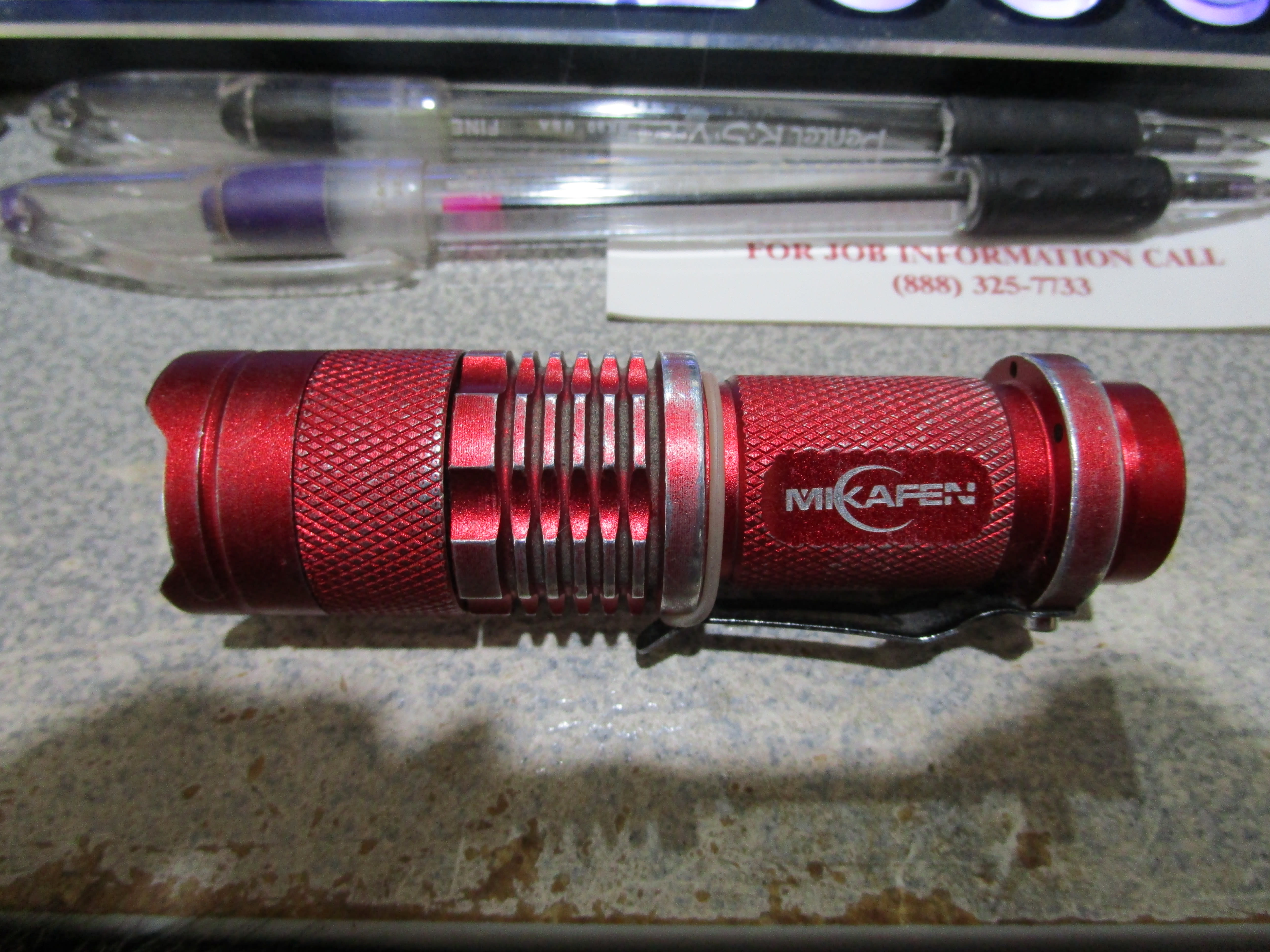 Red pocket flashlight