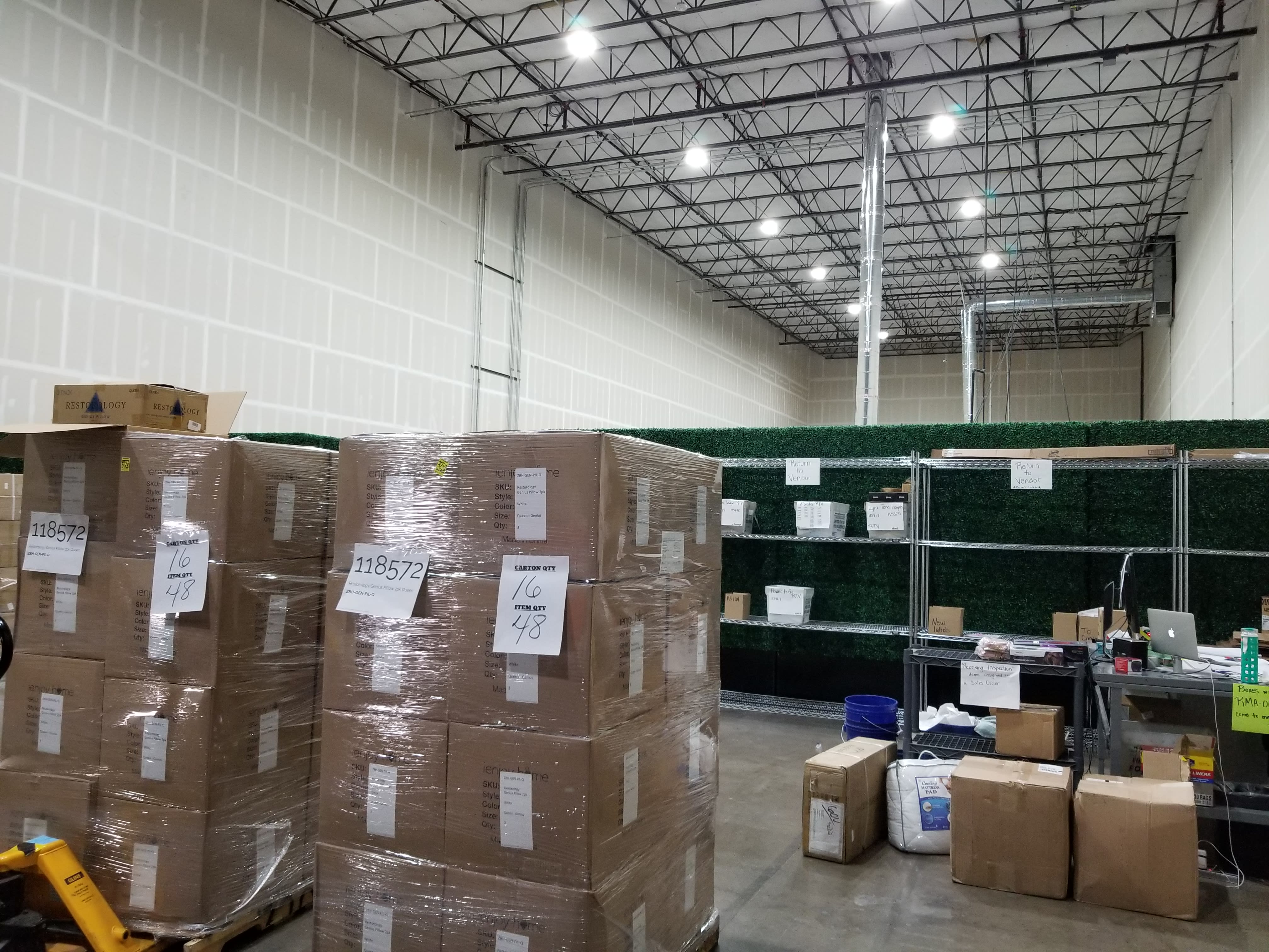 just behind the fake post wedding topiary wall